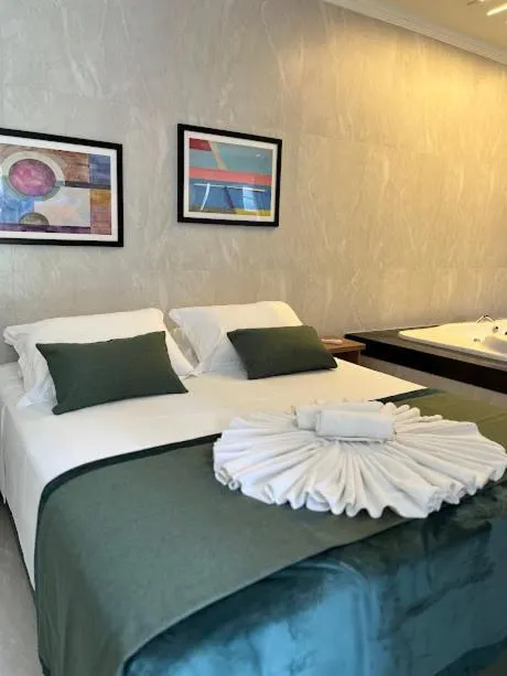 Bed in Pousada Recanto Jota Ge