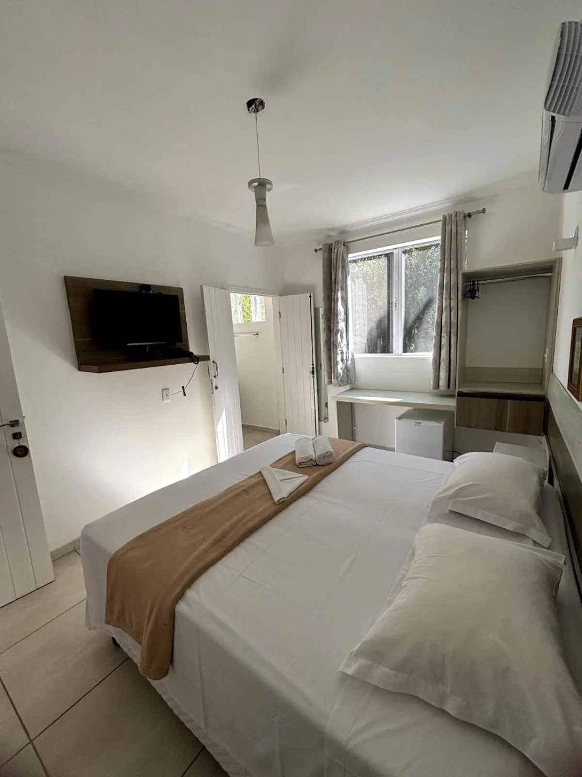 Bed in Pousada Recanto Jota Ge