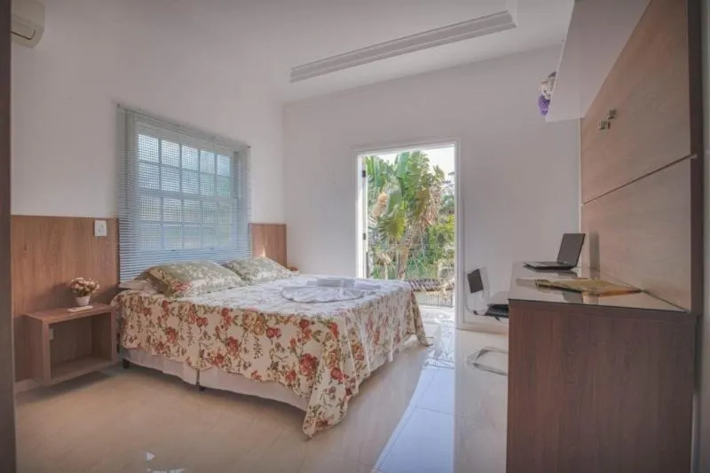 Bed in Pousada Recanto Jota Ge