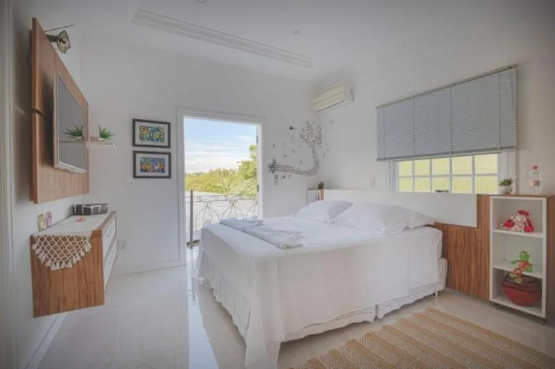 Bed in Pousada Recanto Jota Ge