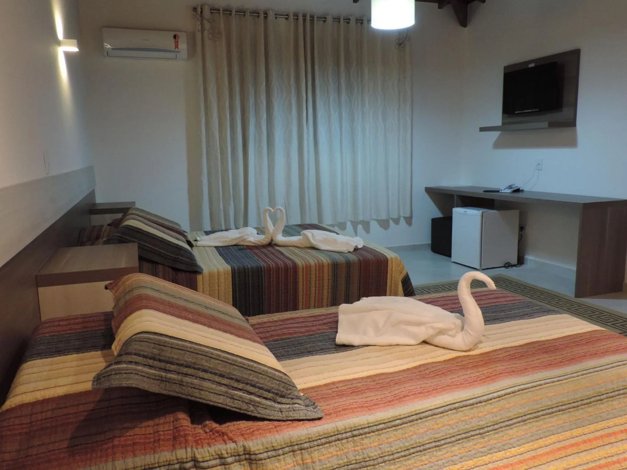 Bed in Pousada Recanto Jota Ge