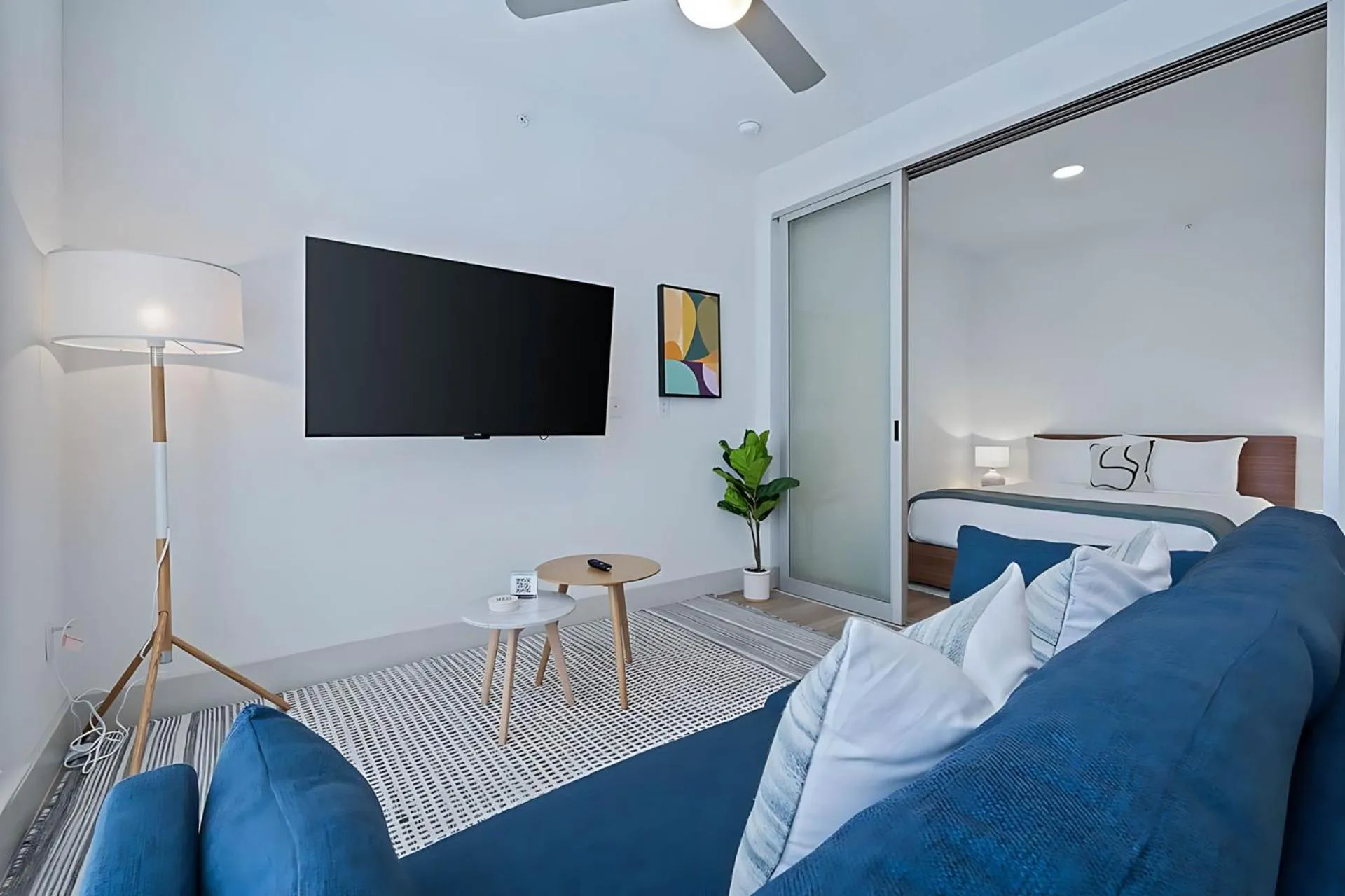Living room, Bed in Placemakr Downtown Austin
