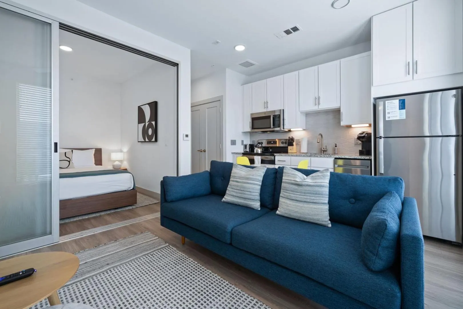 Living room, Bed in Placemakr Downtown Austin