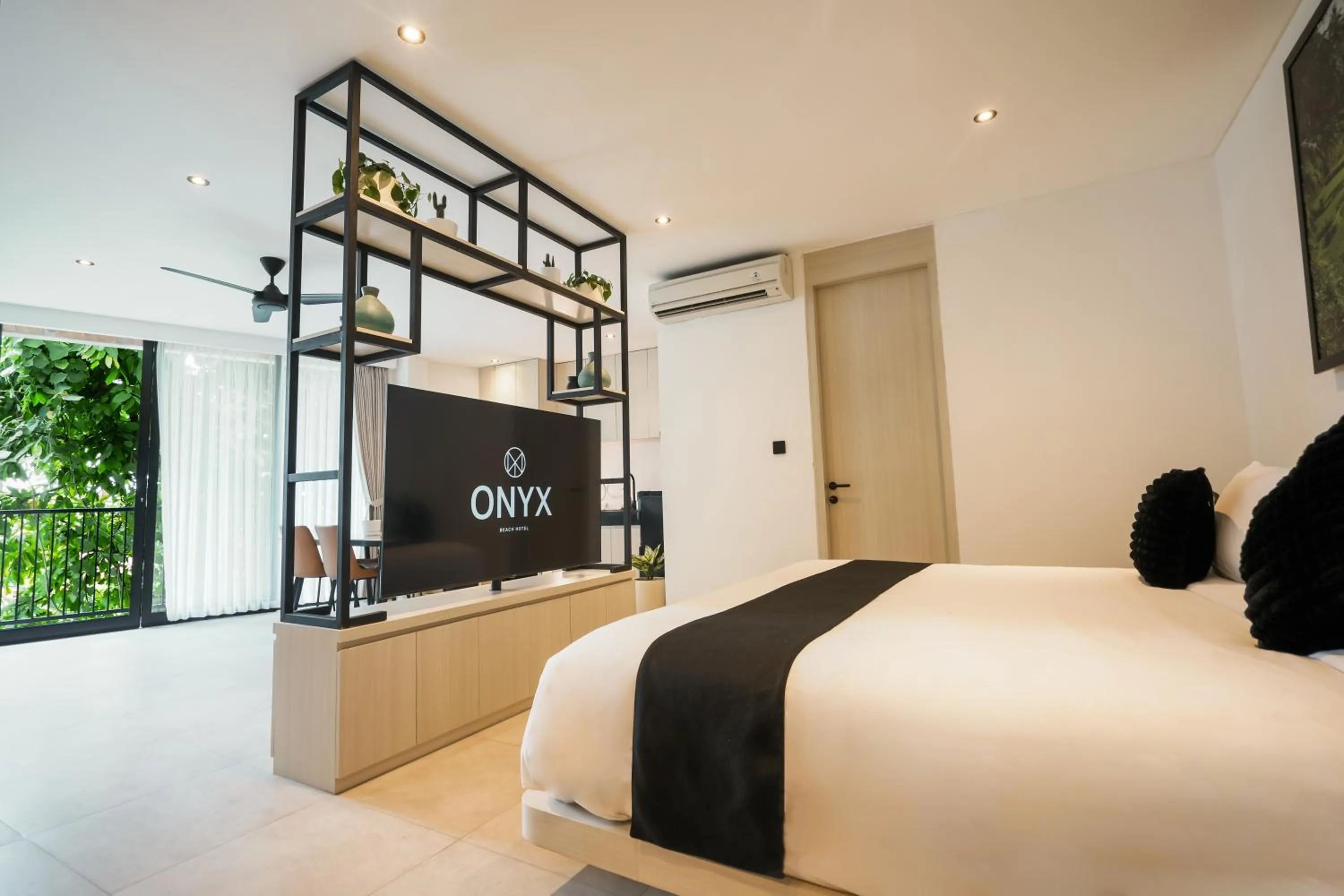 Bed in Onyx Beach Hotel