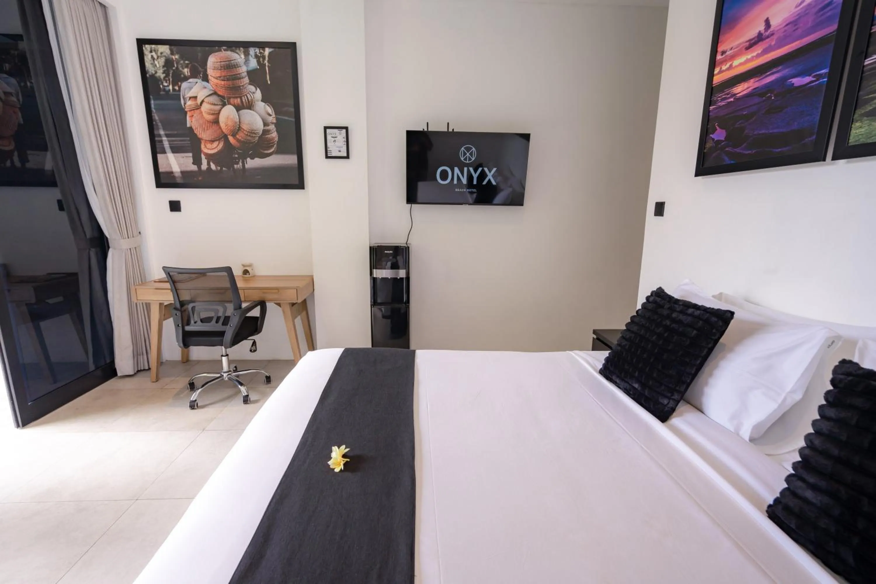 Bed in Onyx Beach Hotel