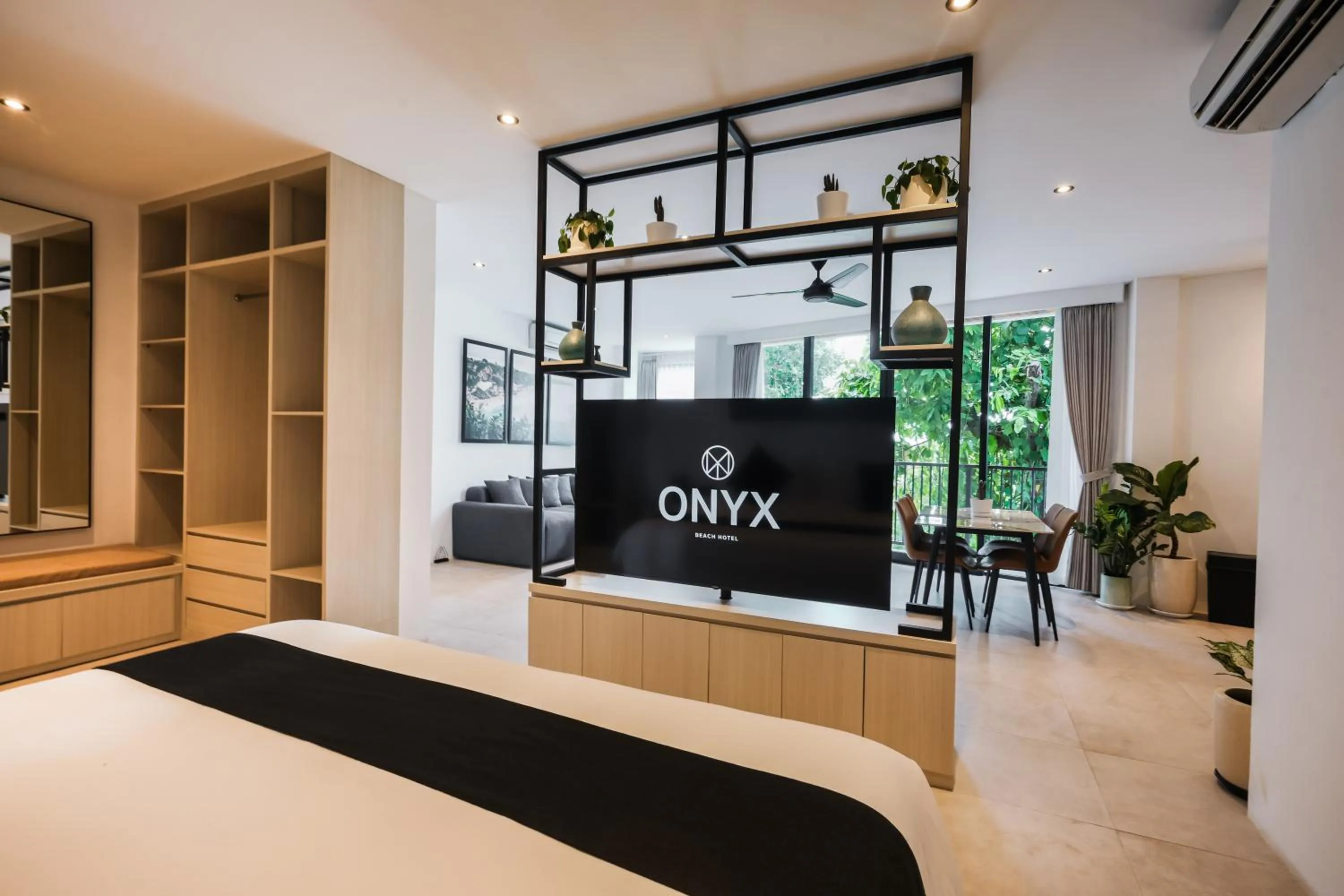 Bed in Onyx Beach Hotel