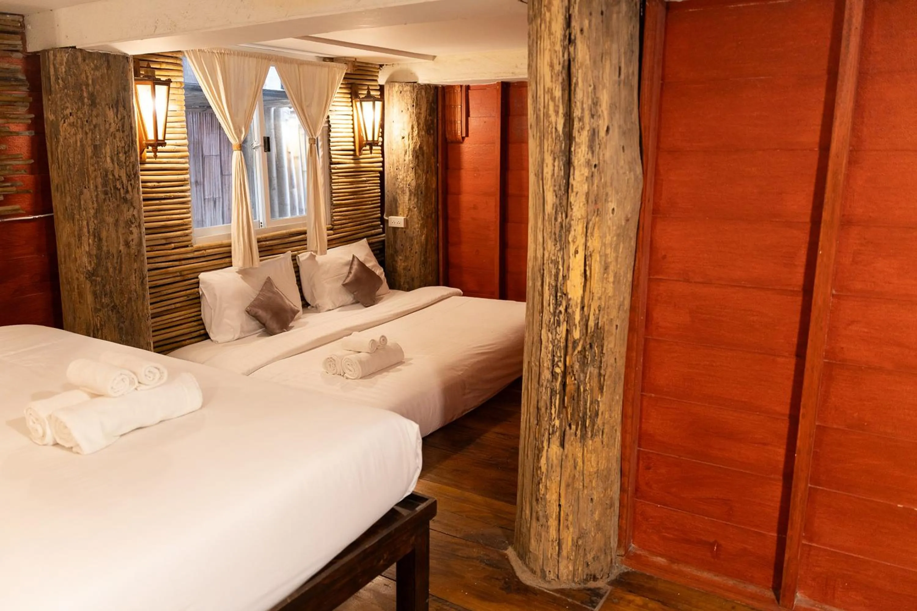 Bed in Monruamsuk Homestay Cafe and Bistro