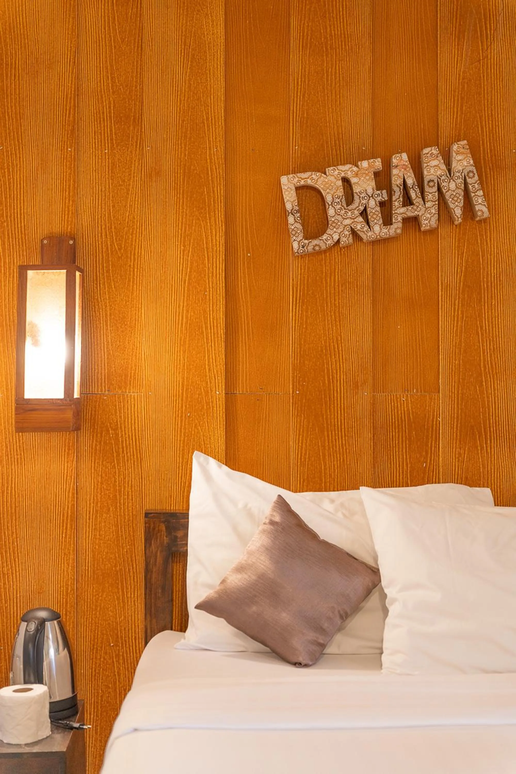 Bed in Monruamsuk Homestay Cafe and Bistro