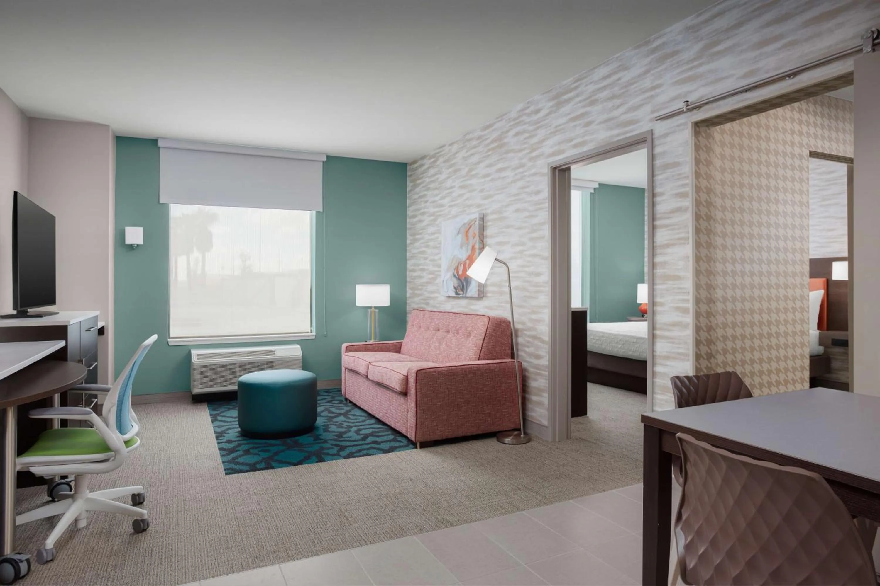 Living room, Bed in Home2 Suites By Hilton Laredo North