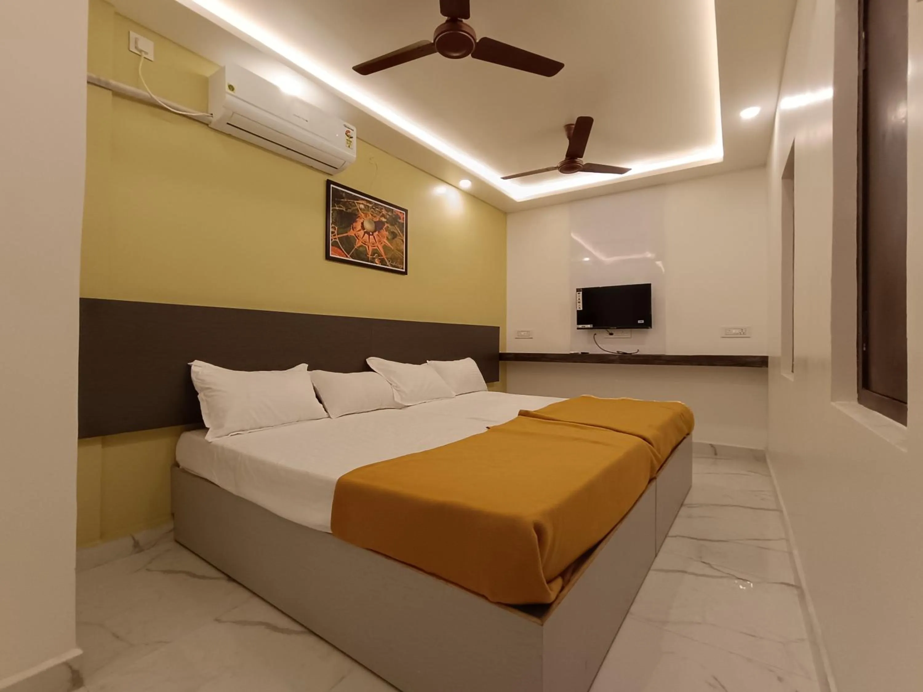 Bed in Arul Residency