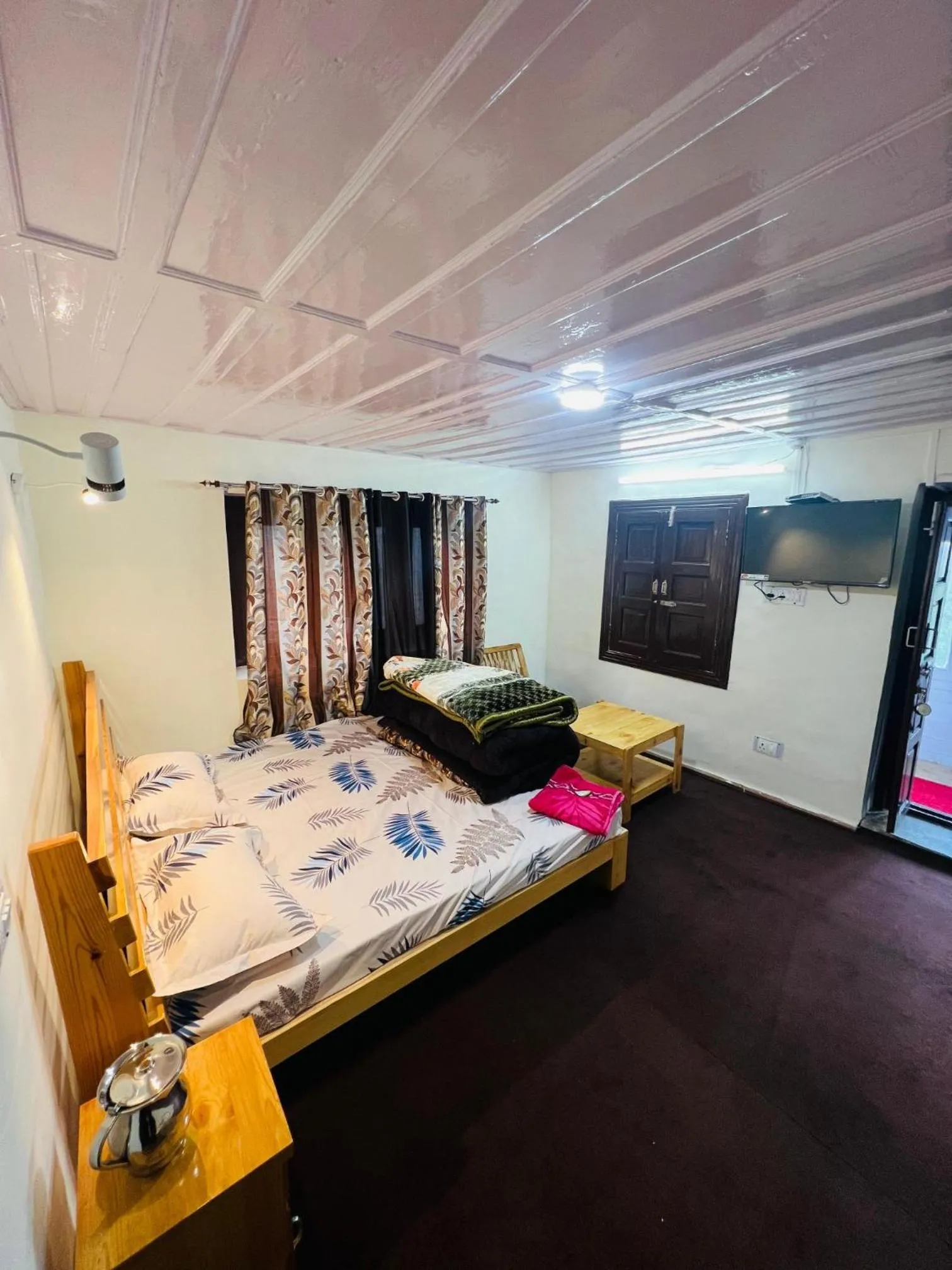 Bed in HOTEL NIRVANA