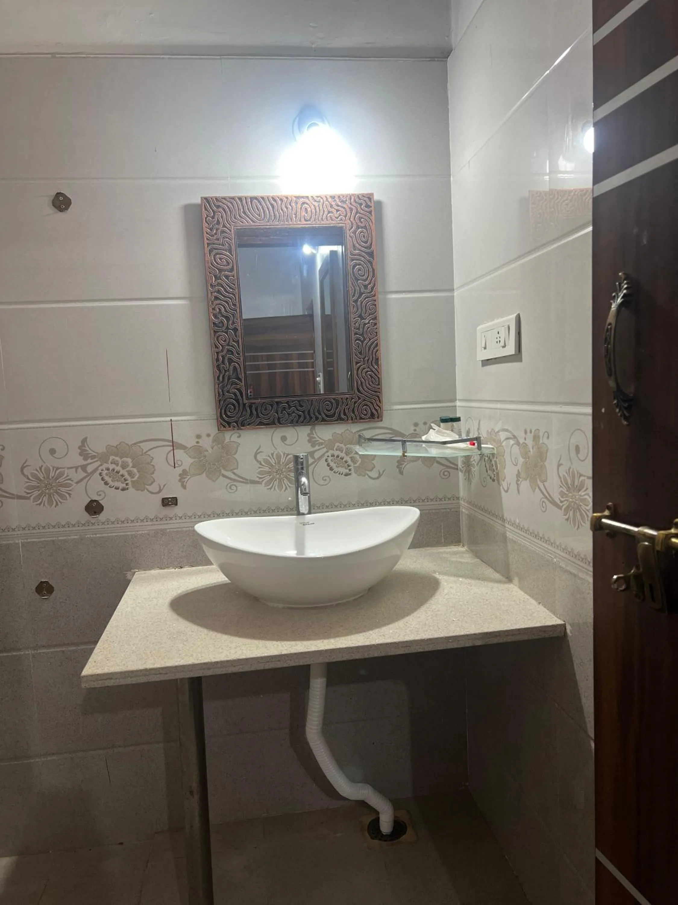 Bathroom in Poojaris Nirantara - Mysuru