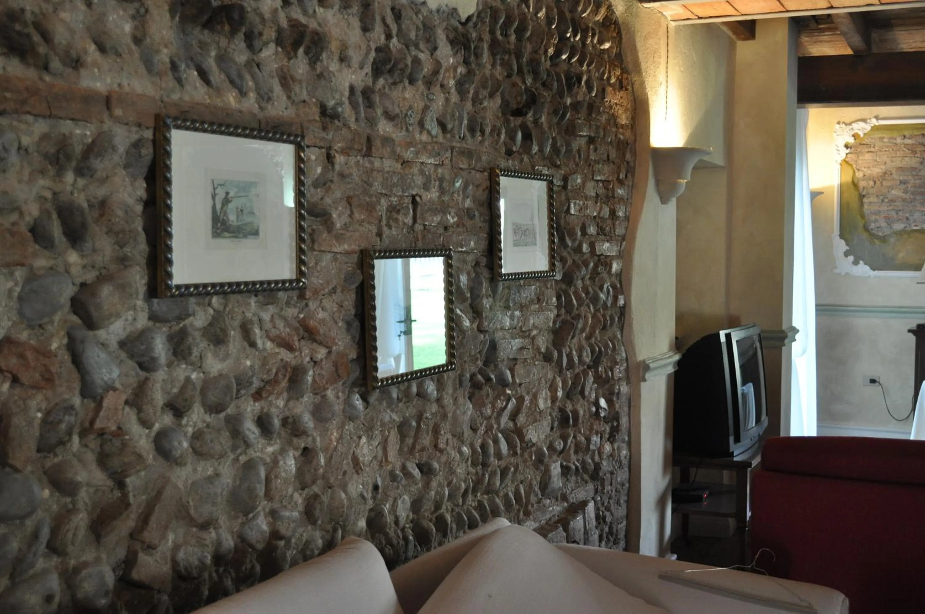 Communal lounge/ TV room, Bed in Le Residenze del Tenore