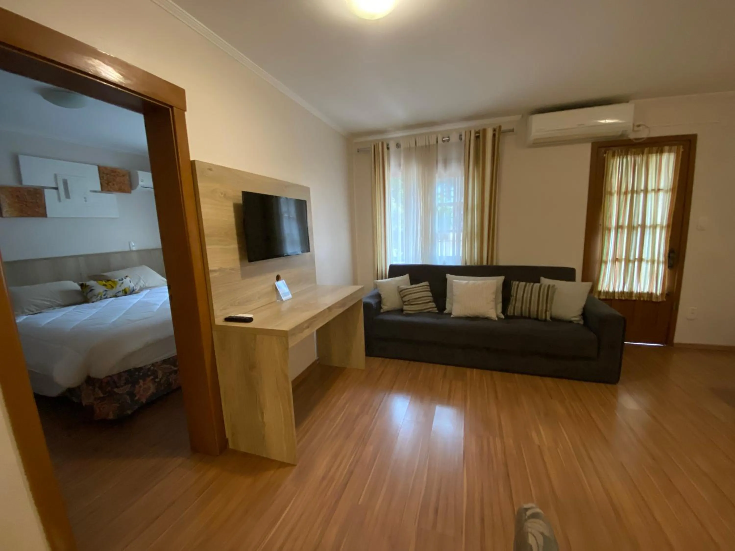 Living room, Bed in Pousada Stillo Gramado