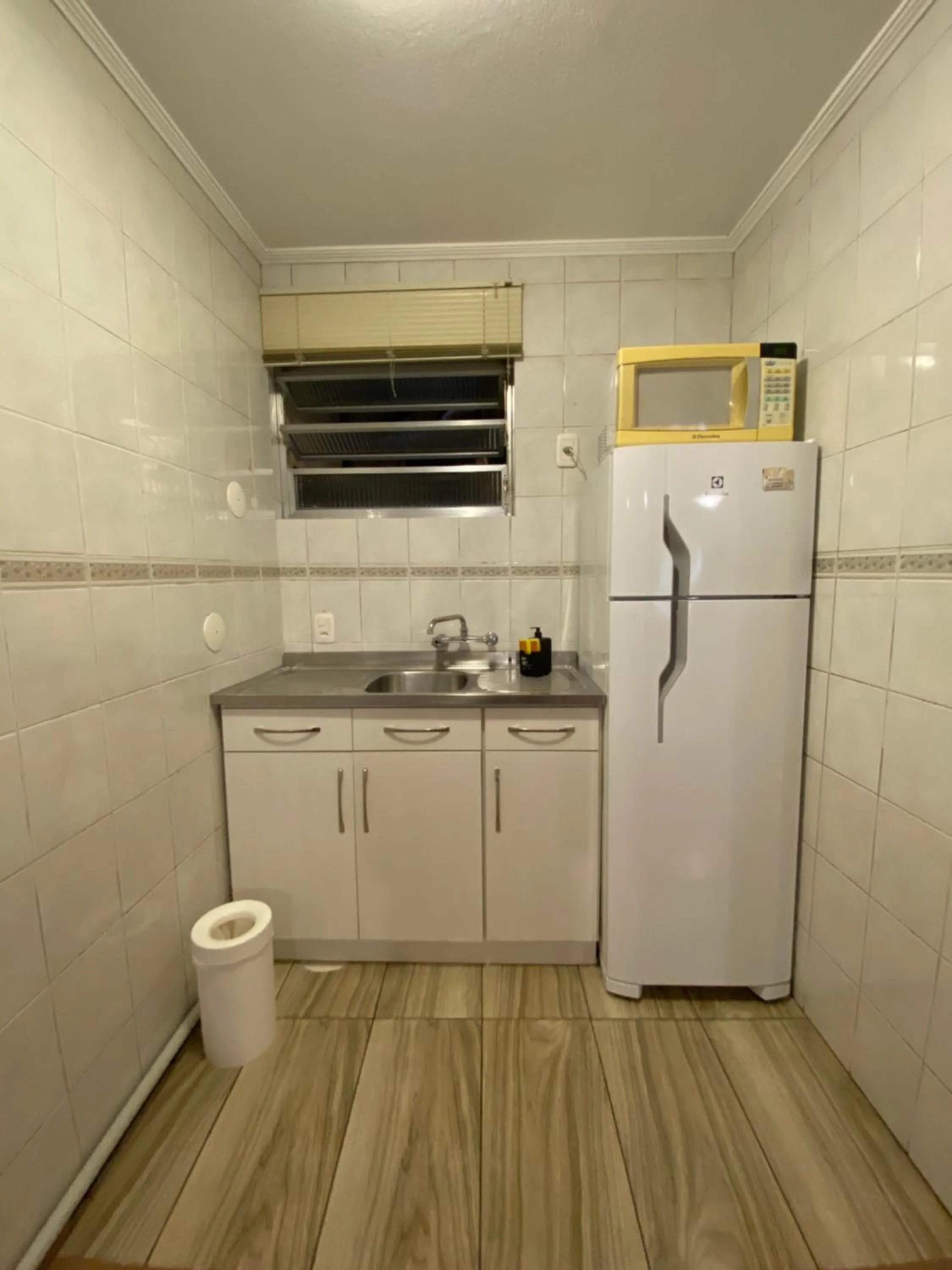 Kitchen or kitchenette in Pousada Stillo Gramado