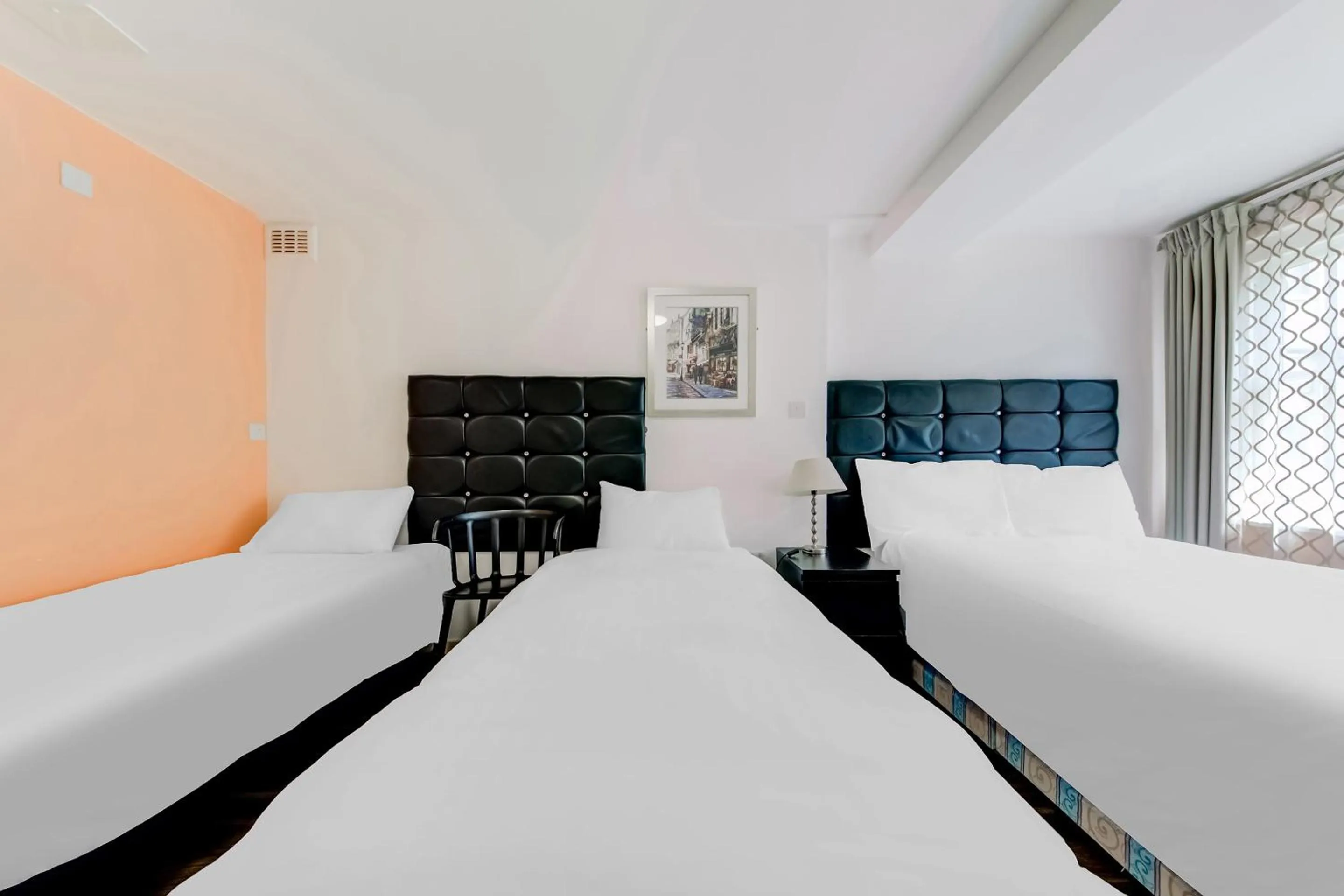 Bedroom in OYO Grantly Hotel