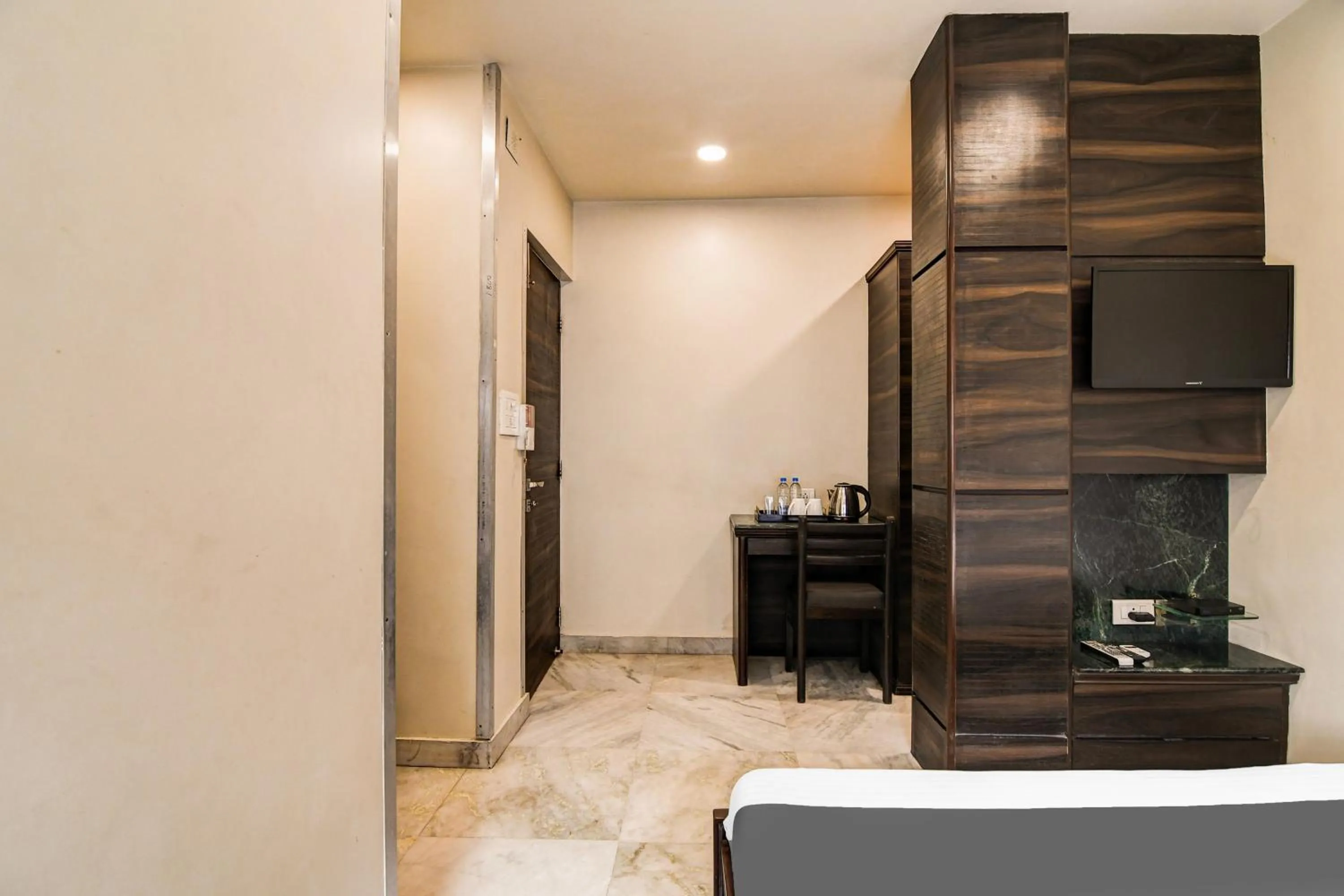 Bedroom in Super Collection O Belgacihia Near Kolkata Railway Station