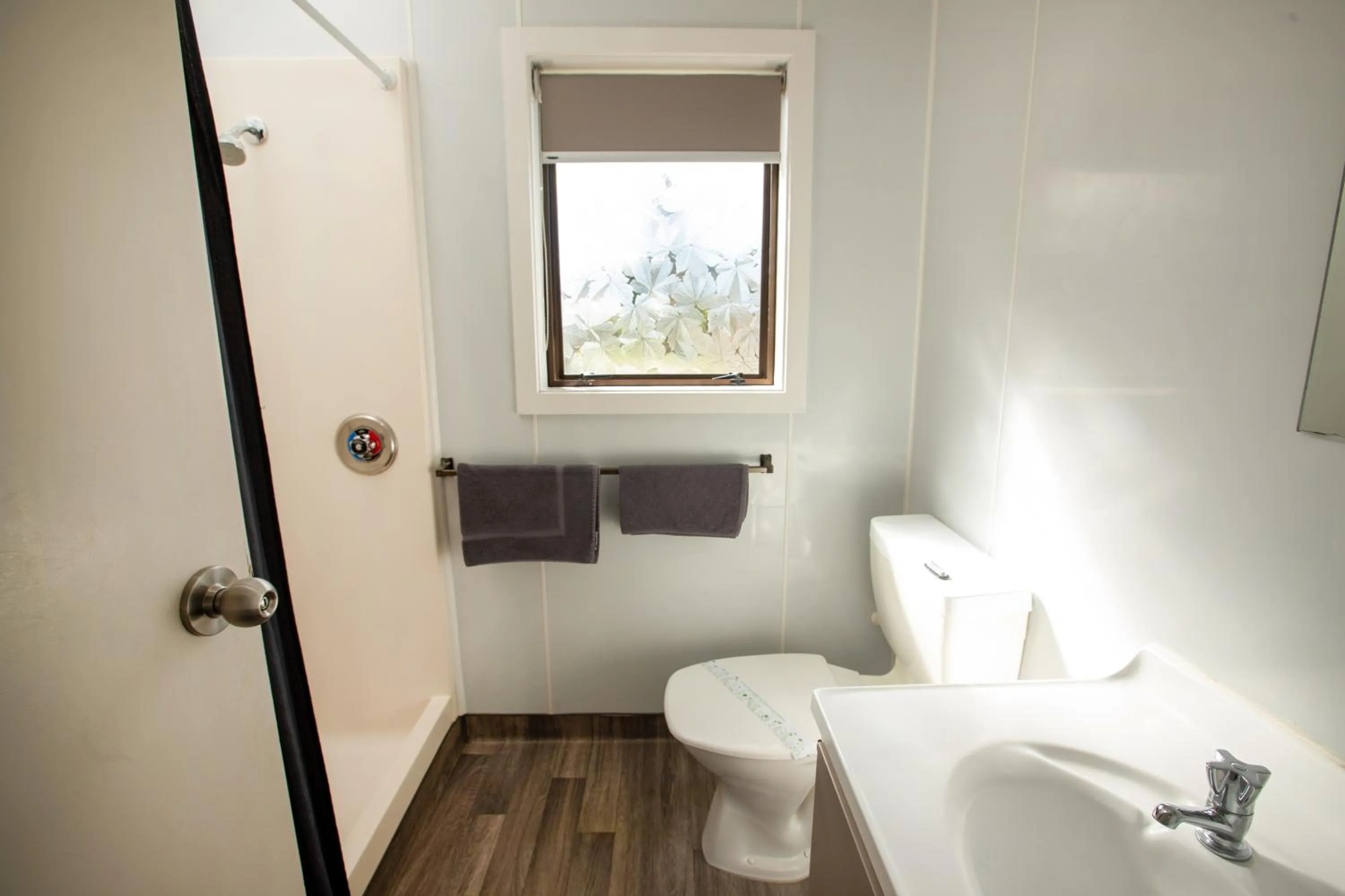 Shower in Tāhuna Beach Holiday Park