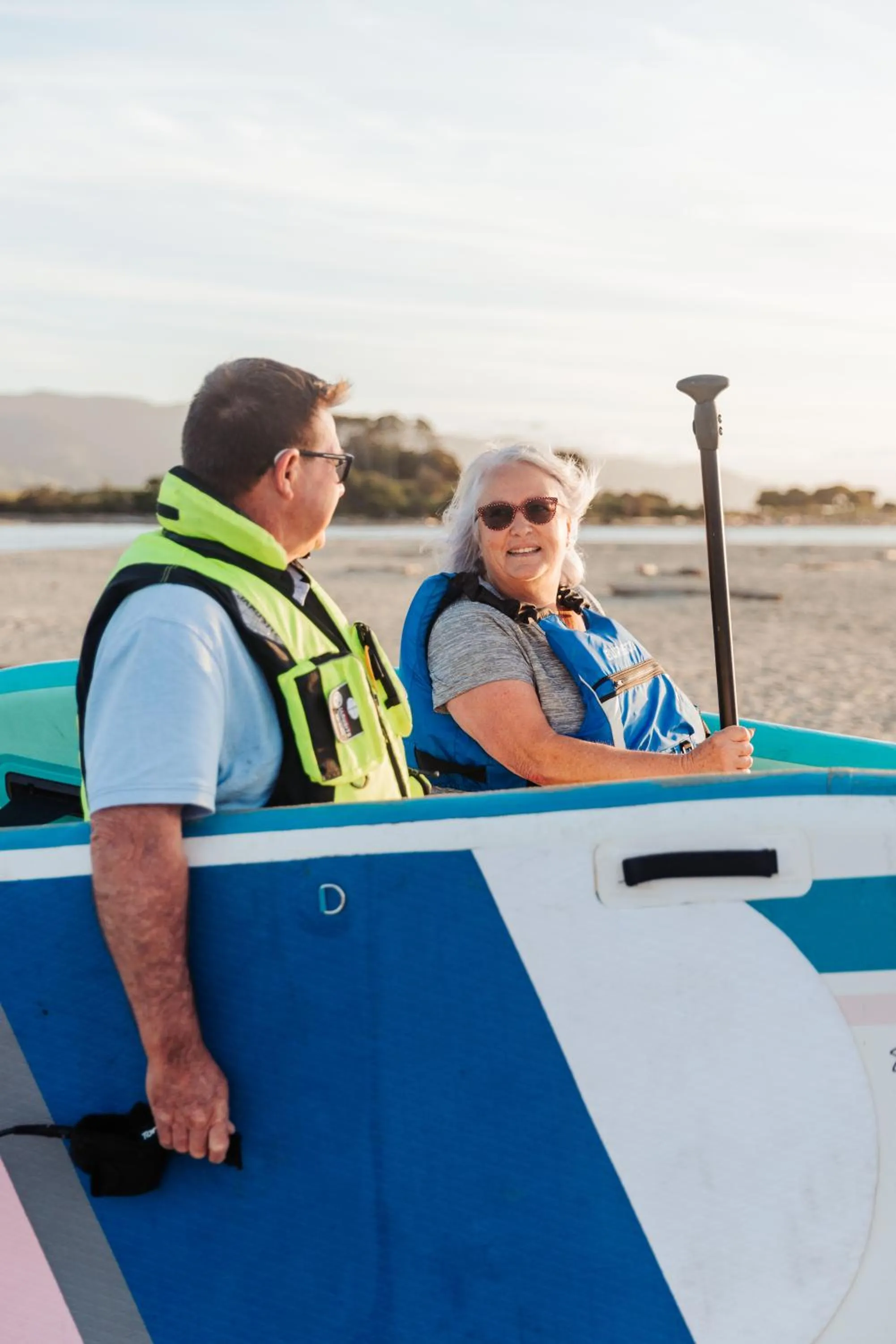 People in Tāhuna Beach Holiday Park