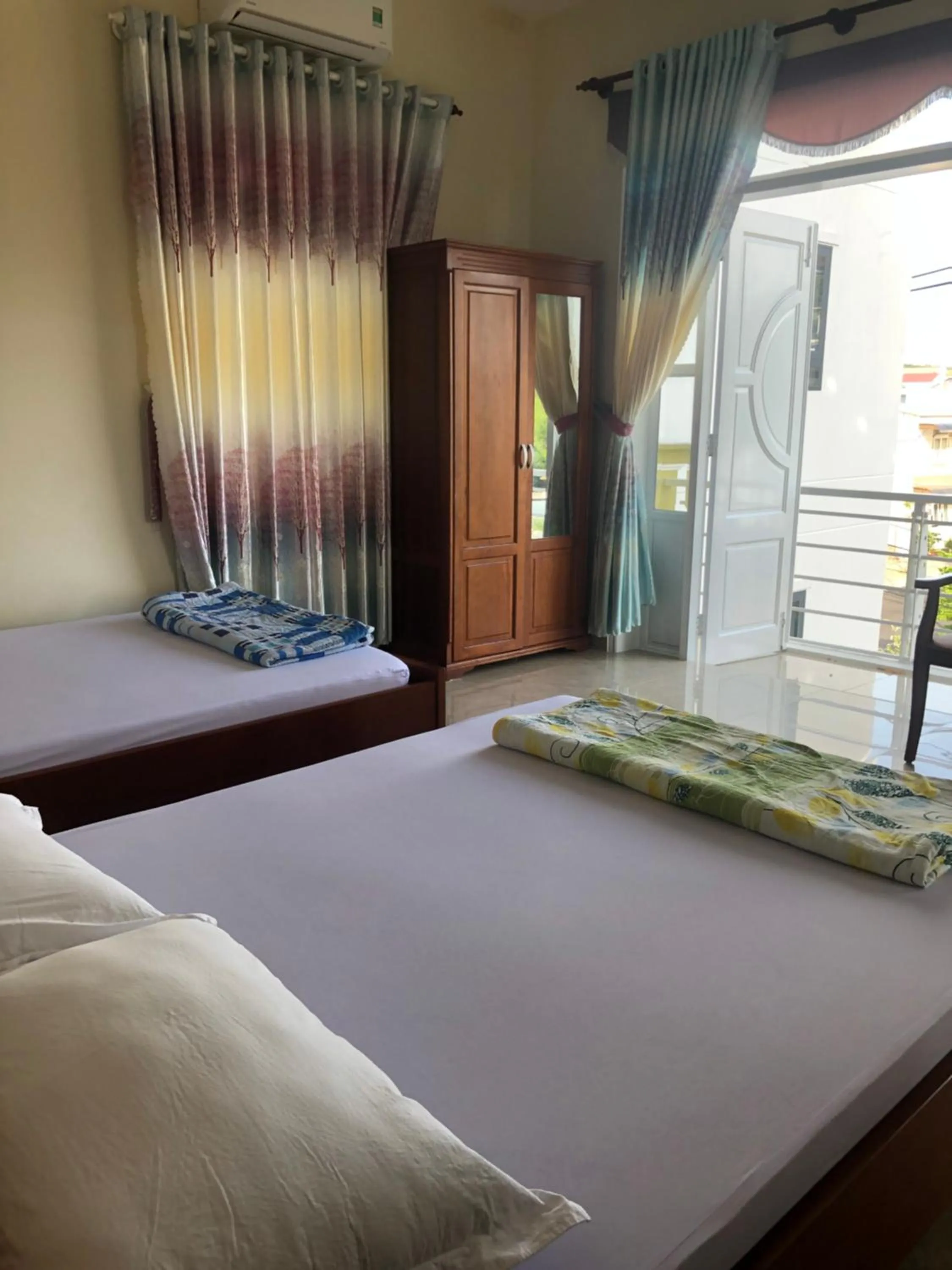 Bed in Quốc Ân Motel