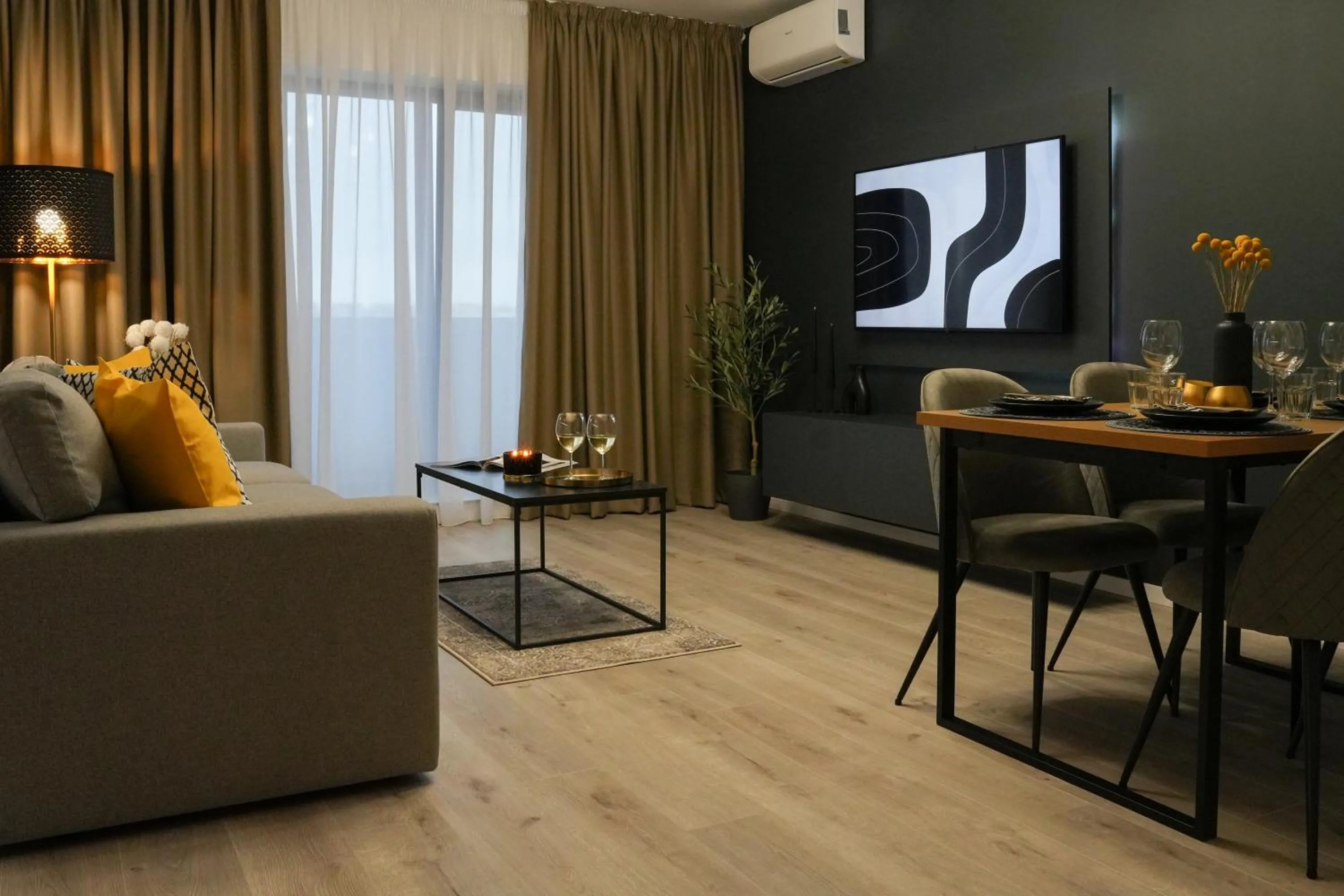 Living room in Luca - Luxury Park-View Apt with Balcony & Parking