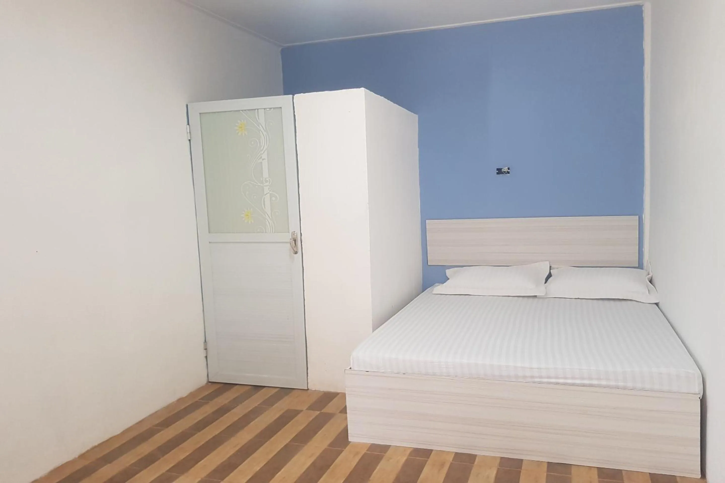 Bedroom in Hotel O Tasya Homestay