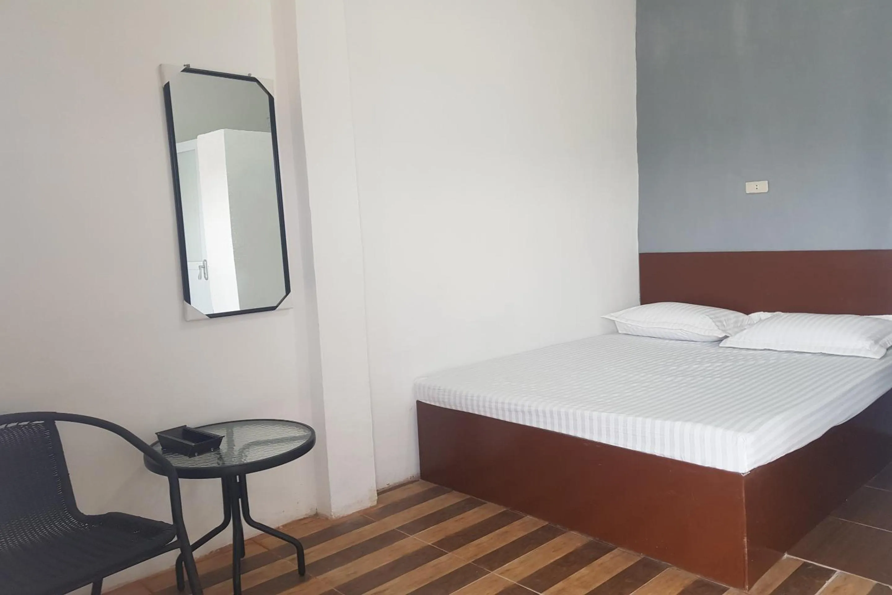 Bedroom in Hotel O Tasya Homestay