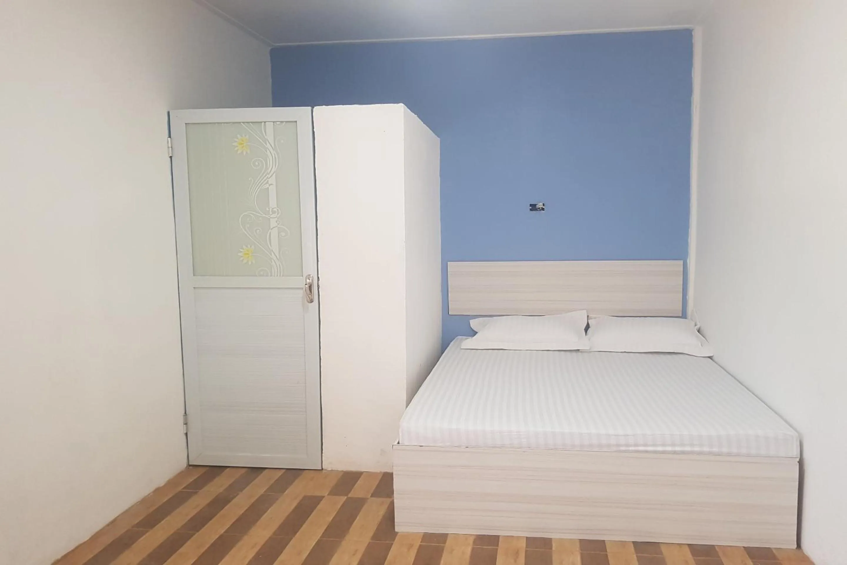 Bedroom in Hotel O Tasya Homestay