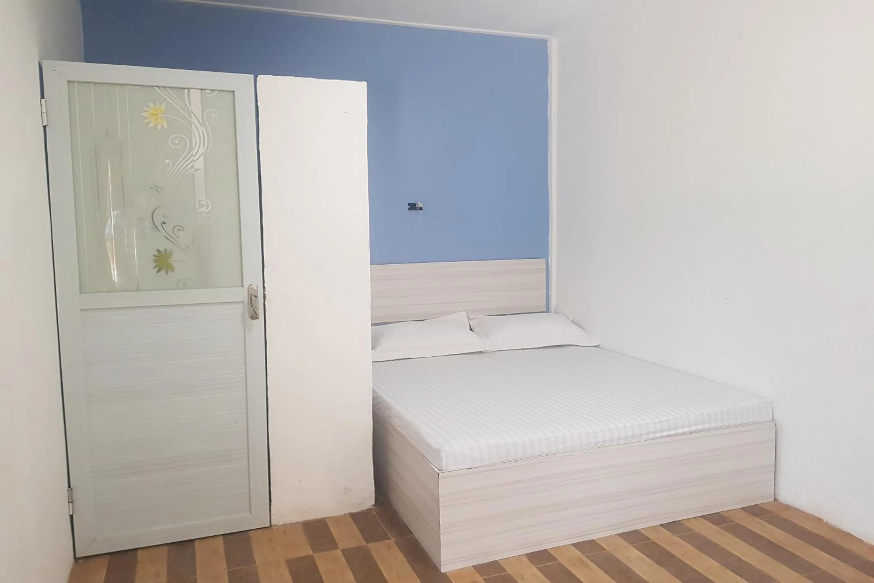 Bedroom in Hotel O Tasya Homestay