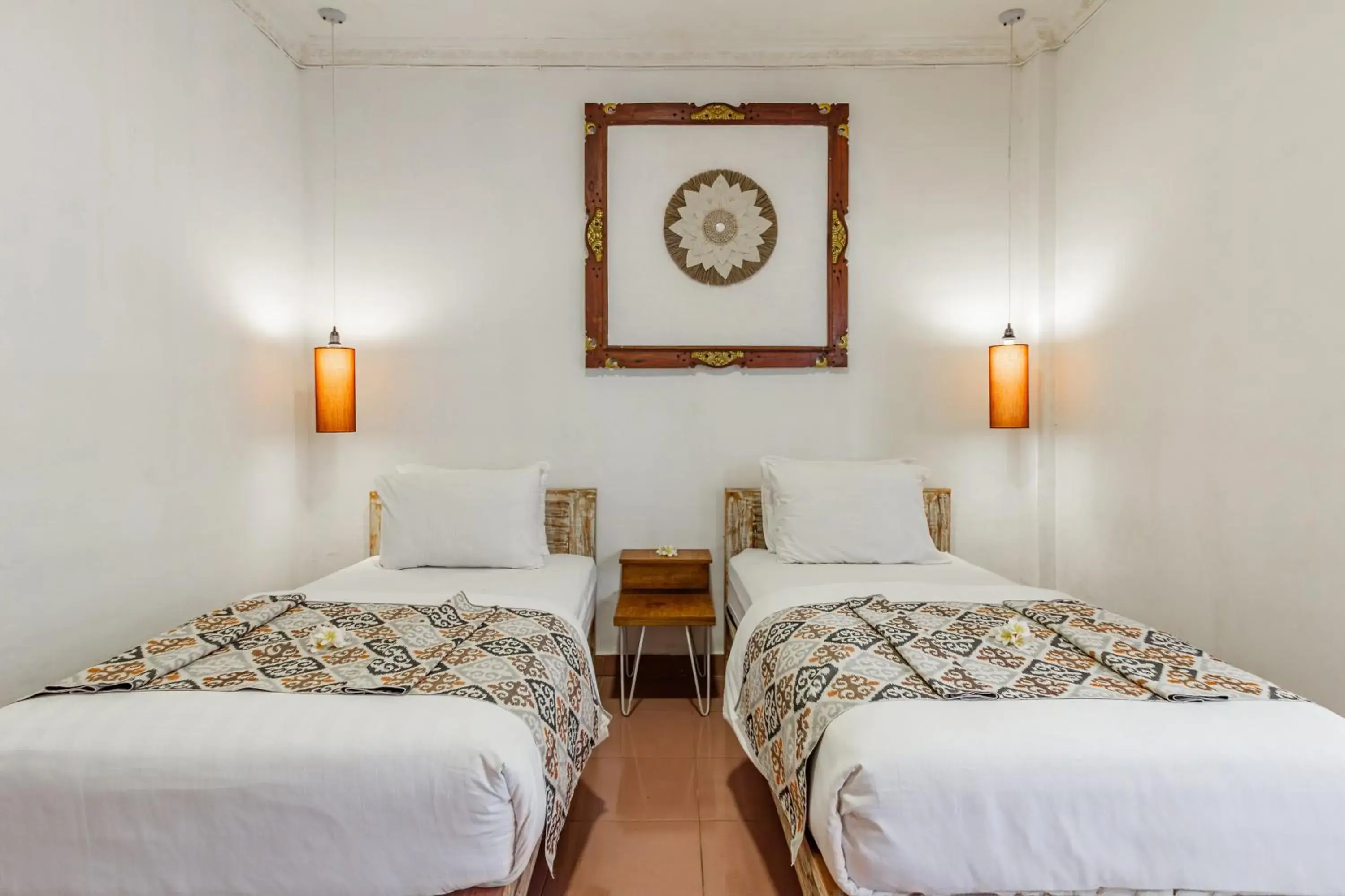 Economy Twin Room in Capital O 93944 Geweka Homestay Economy Twin Room in Capital O 93944 Geweka Homestay