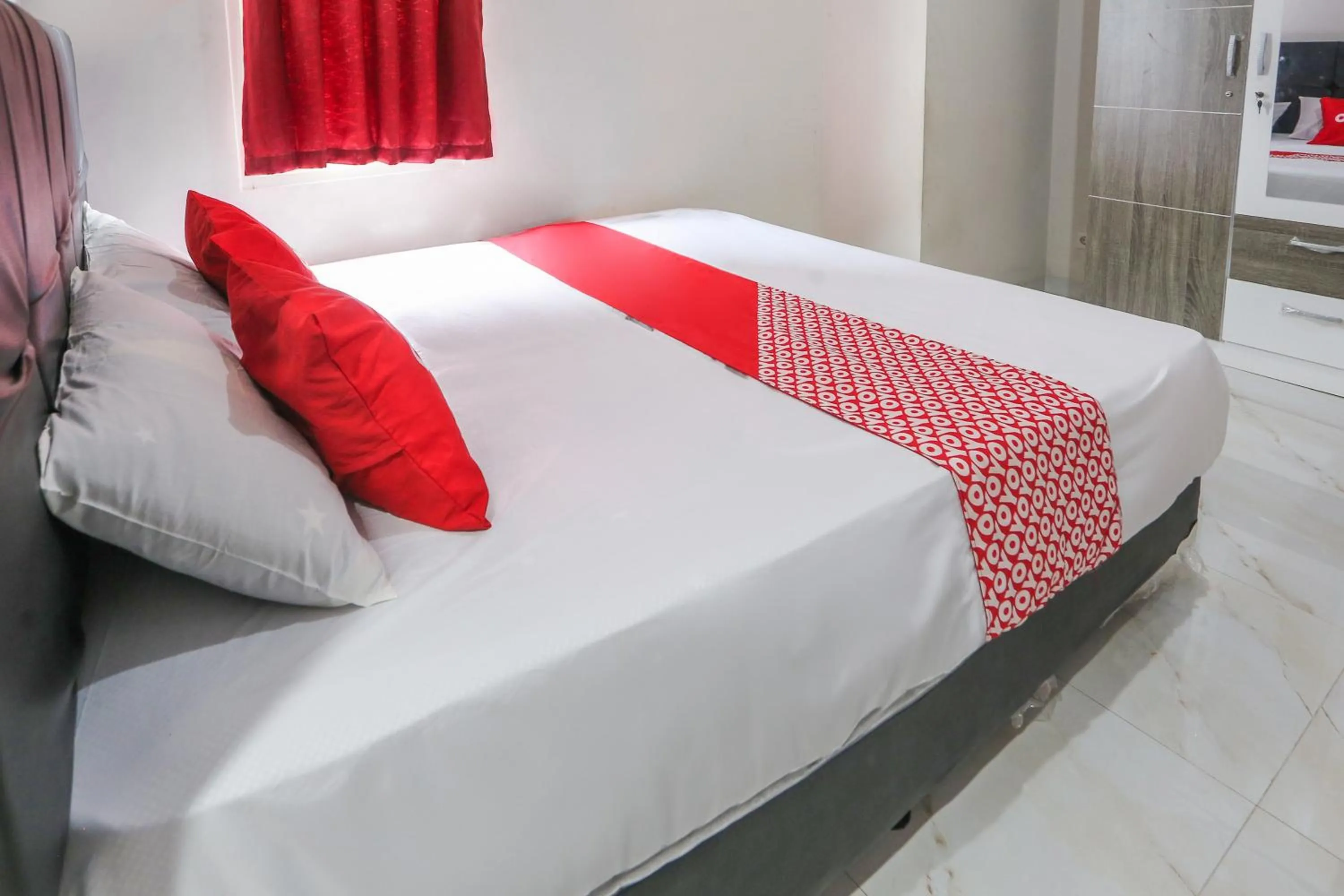 Bedroom, Bed in OYO 93948 Bunda Rachma Rooms