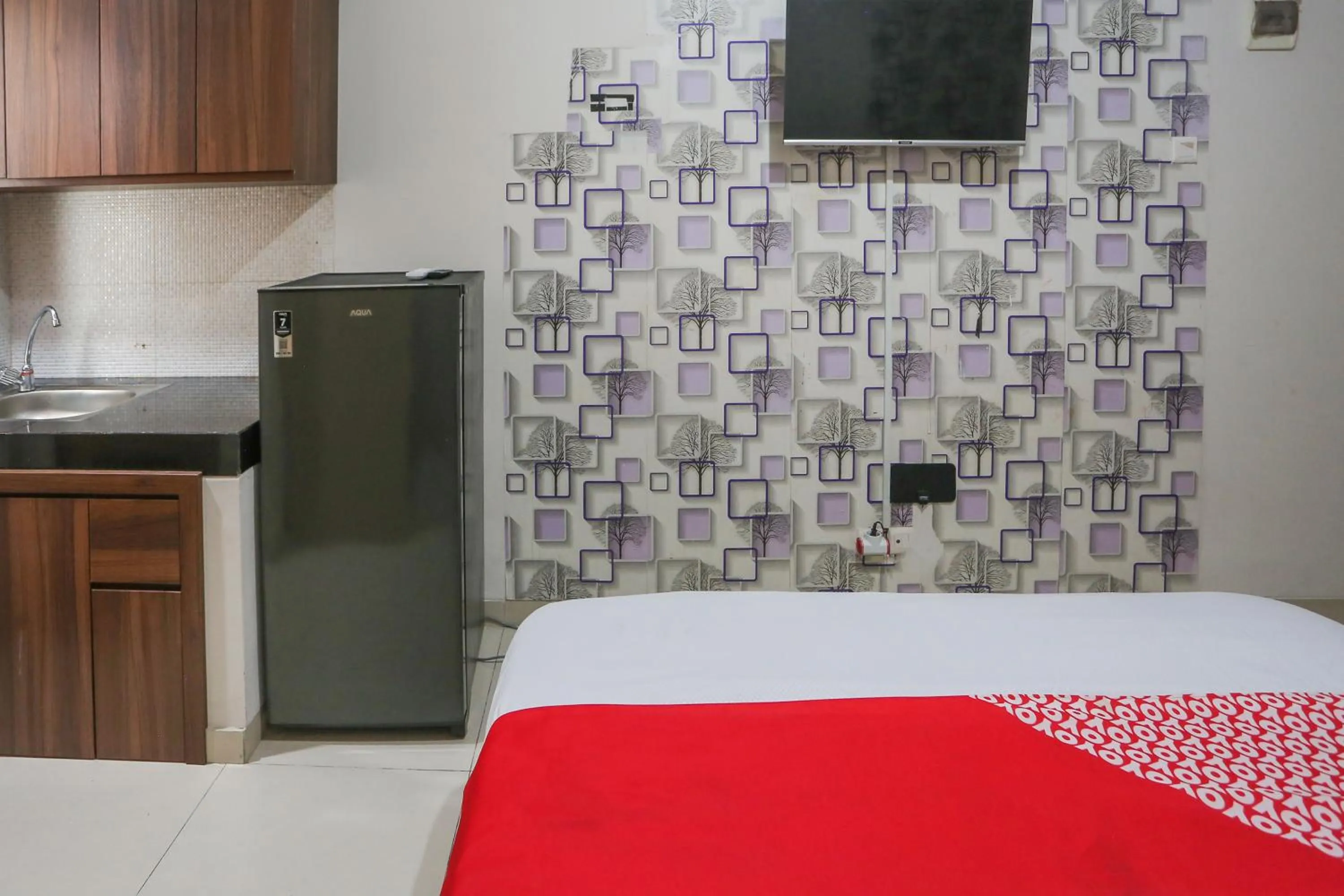 Bedroom, Bed in OYO 93948 Bunda Rachma Rooms