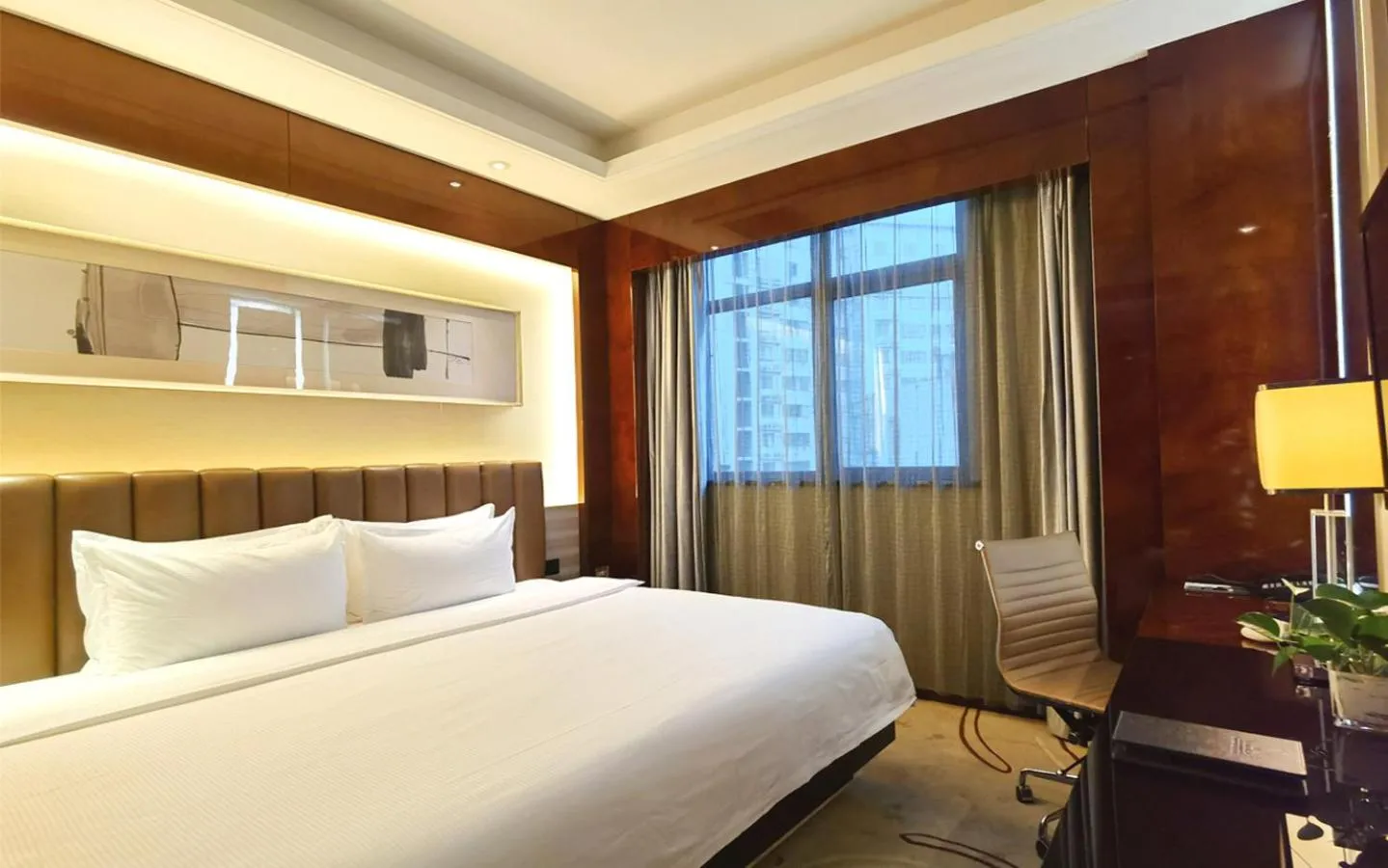 Bed in Ramada Changzhou North Hotel