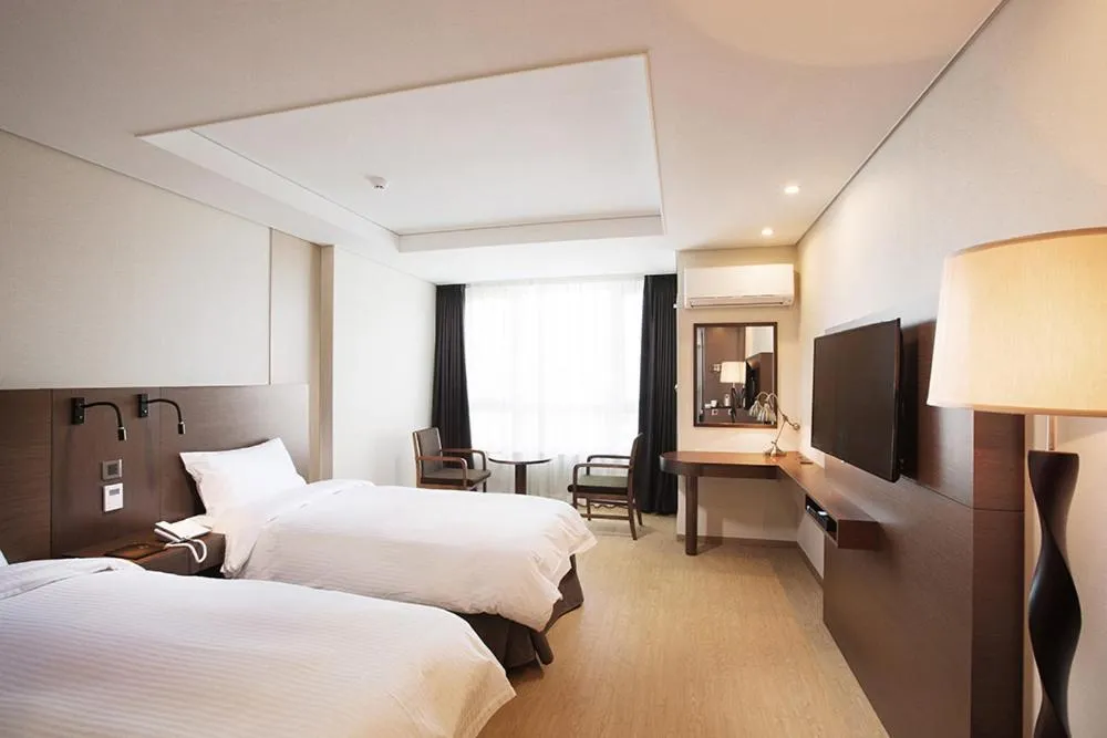 Bed in Crown Harbor Hotel Busan