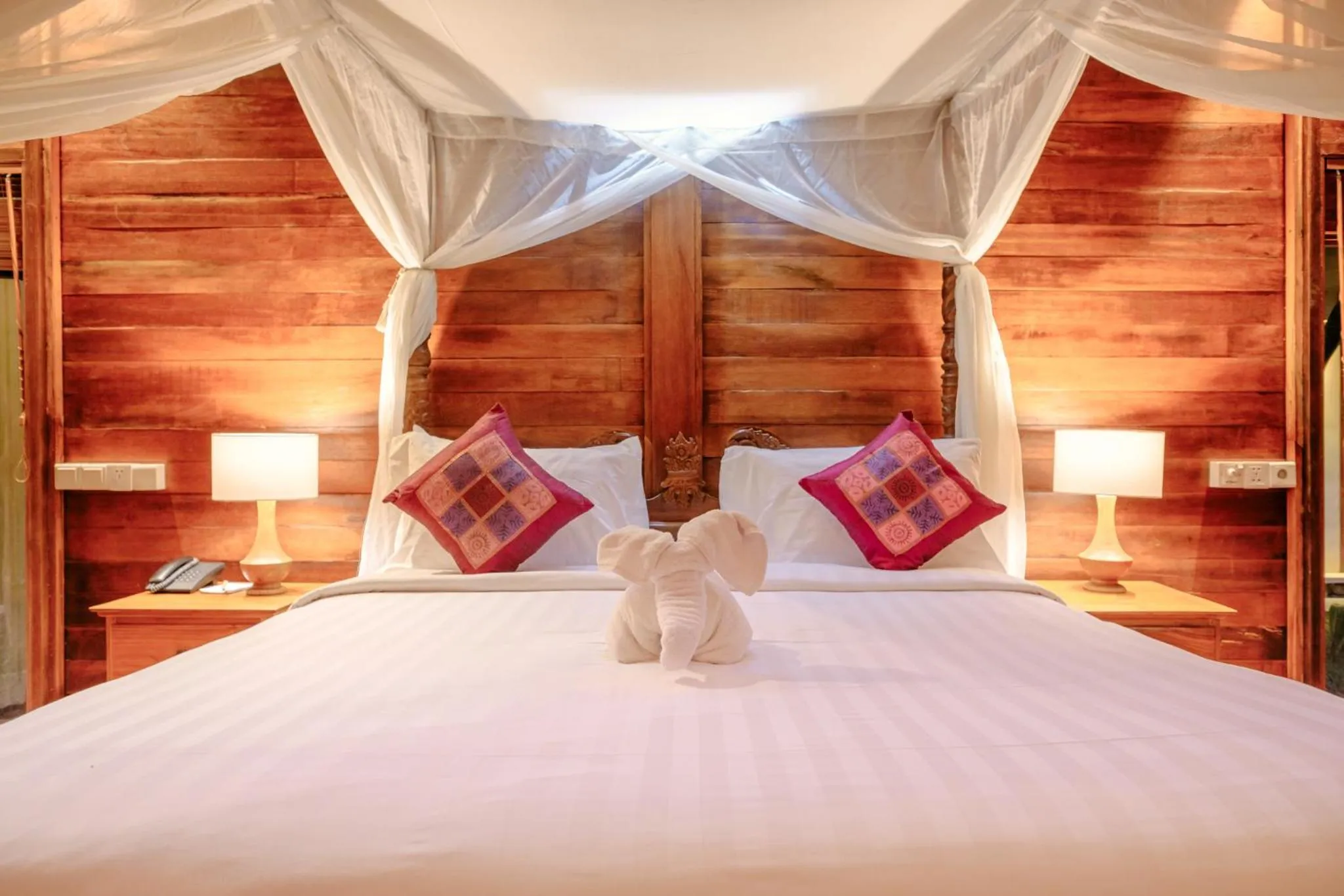 Bed in BeingSattvaa Luxury Ubud
