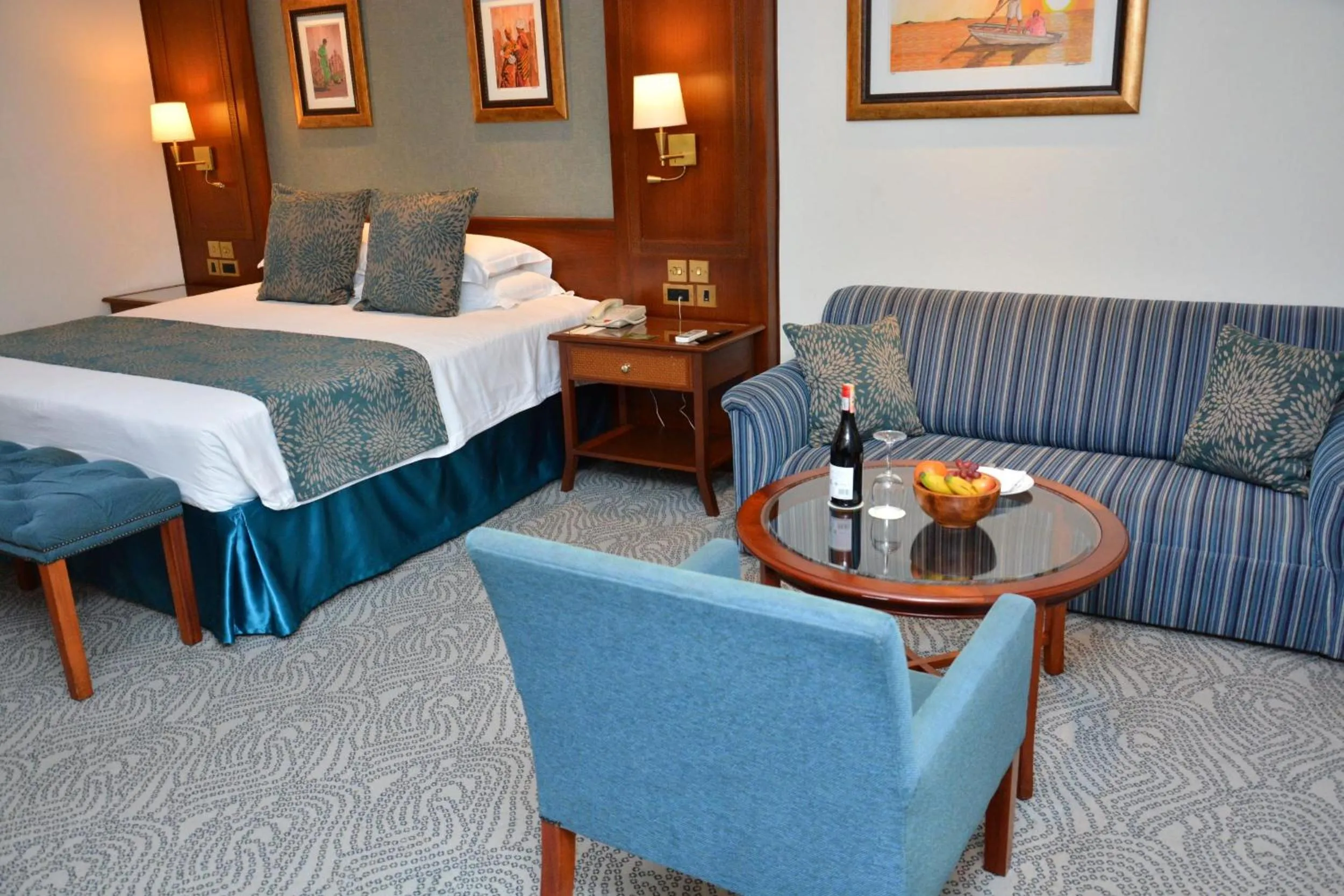 Seating area, Bed in Kampala Serena Hotel