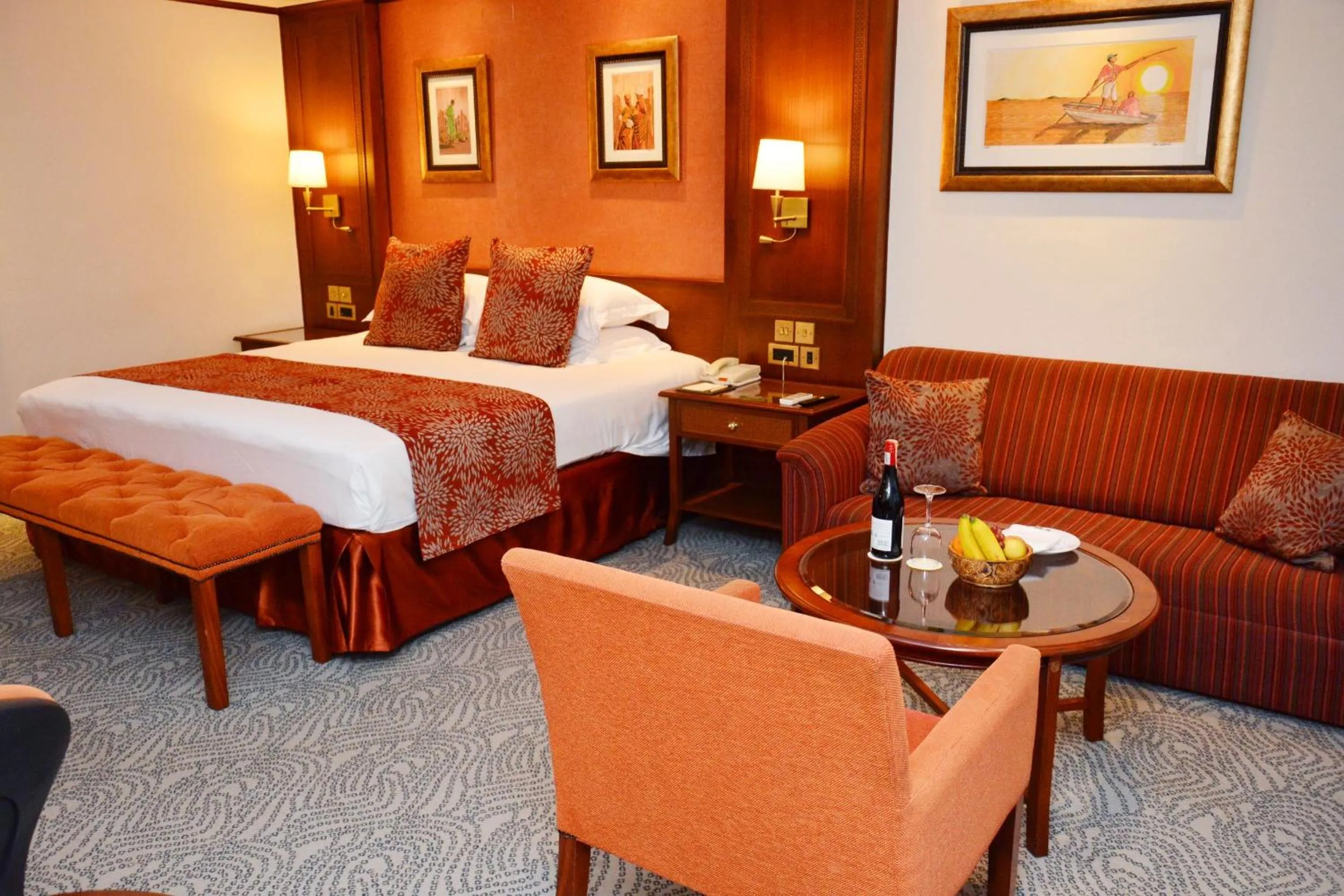 Seating area, Bed in Kampala Serena Hotel