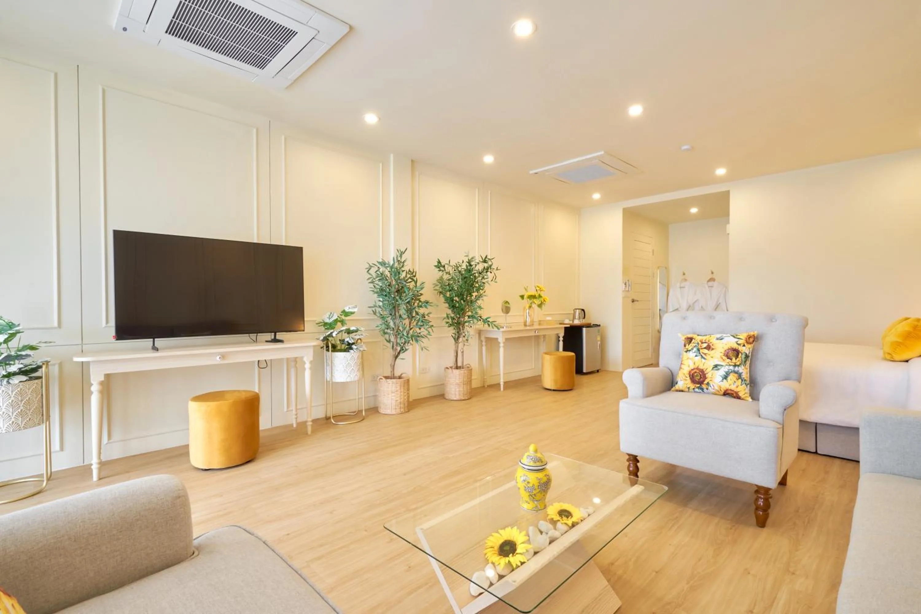 Communal lounge/ TV room in Hawa House Phuket