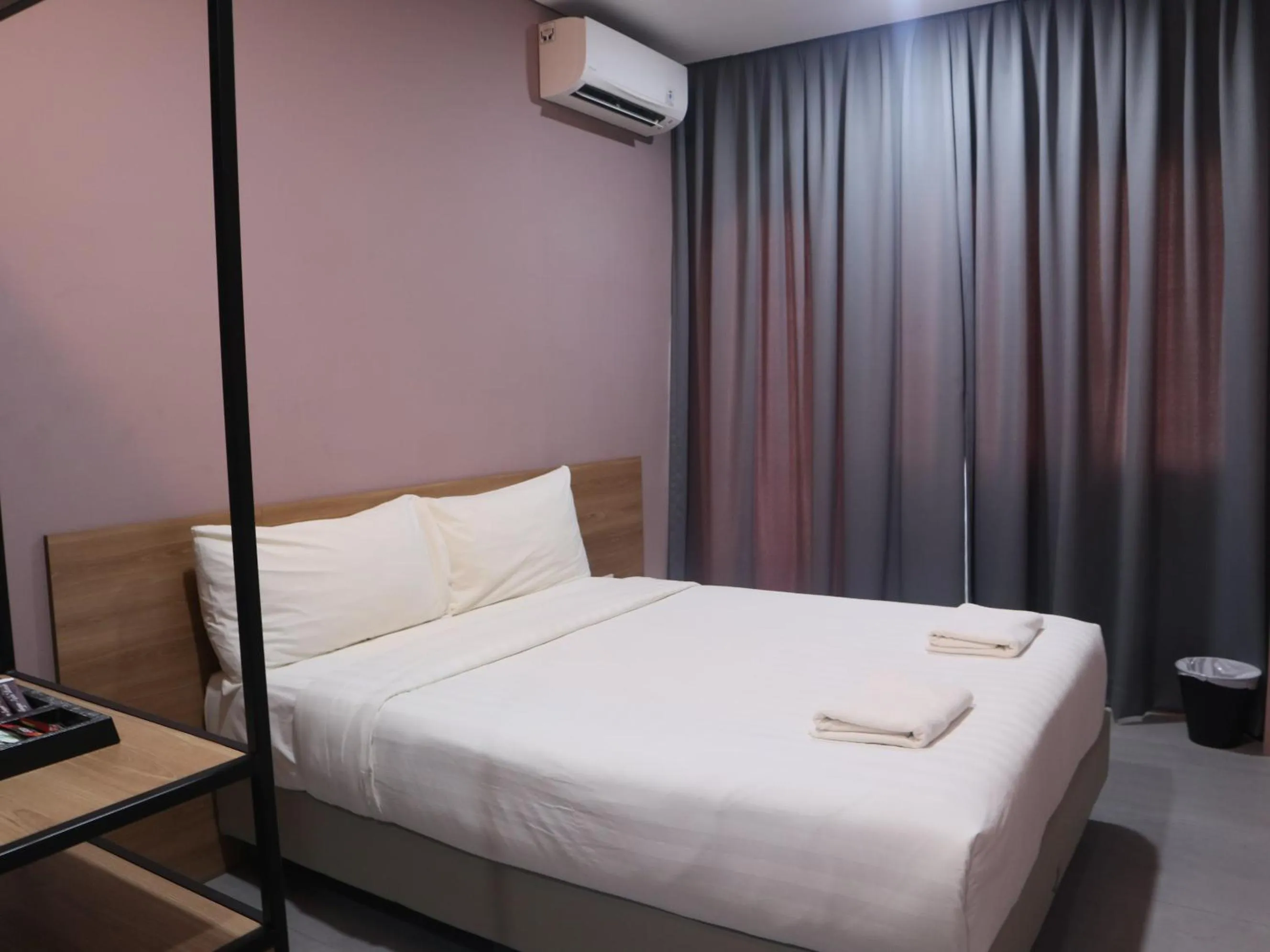 Bed in VNC Alam Sutera Hotel Powered by Archipelago