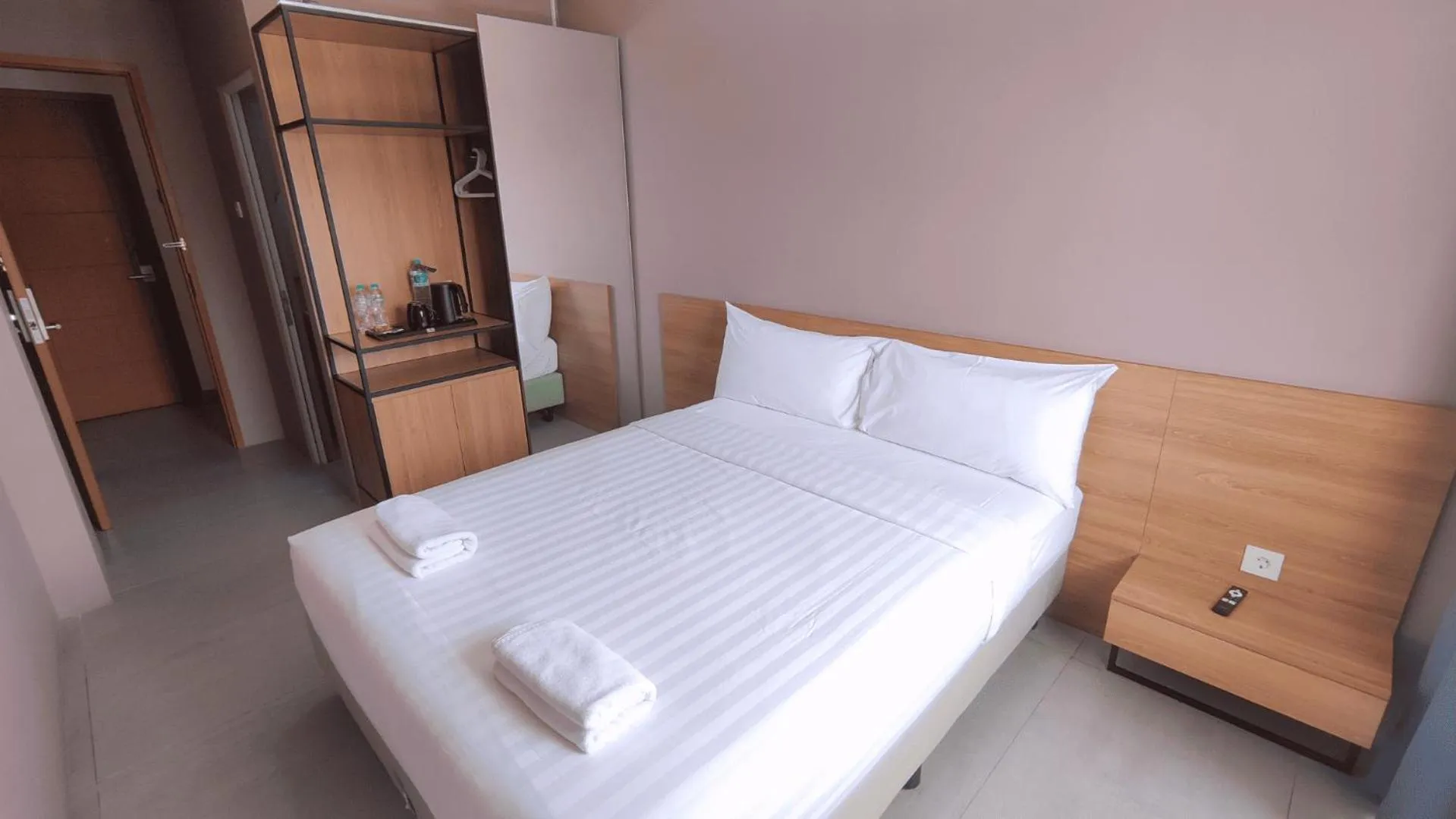 Bed in VNC Alam Sutera Hotel Powered by Archipelago