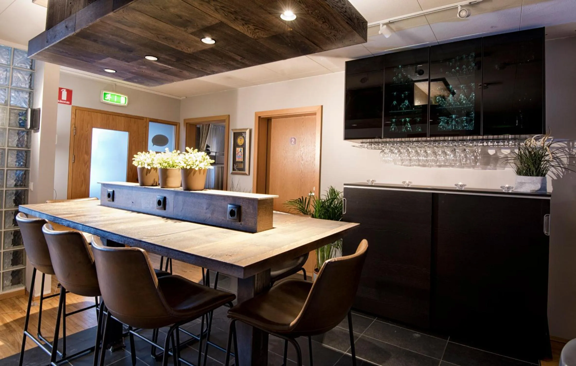 Communal lounge/ TV room in B14 Hostel