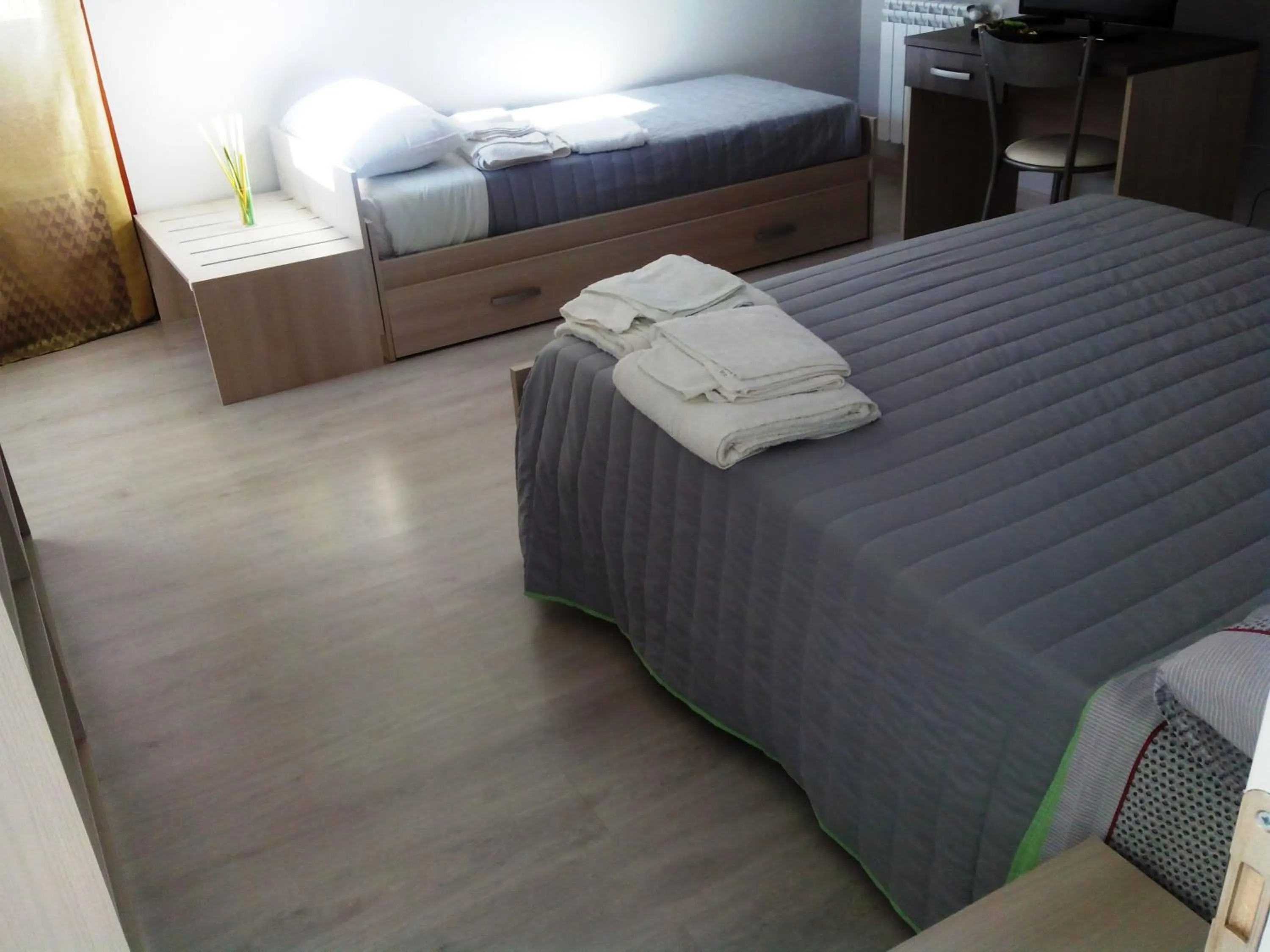 Photo of the whole room, Bed in I Gelsomini