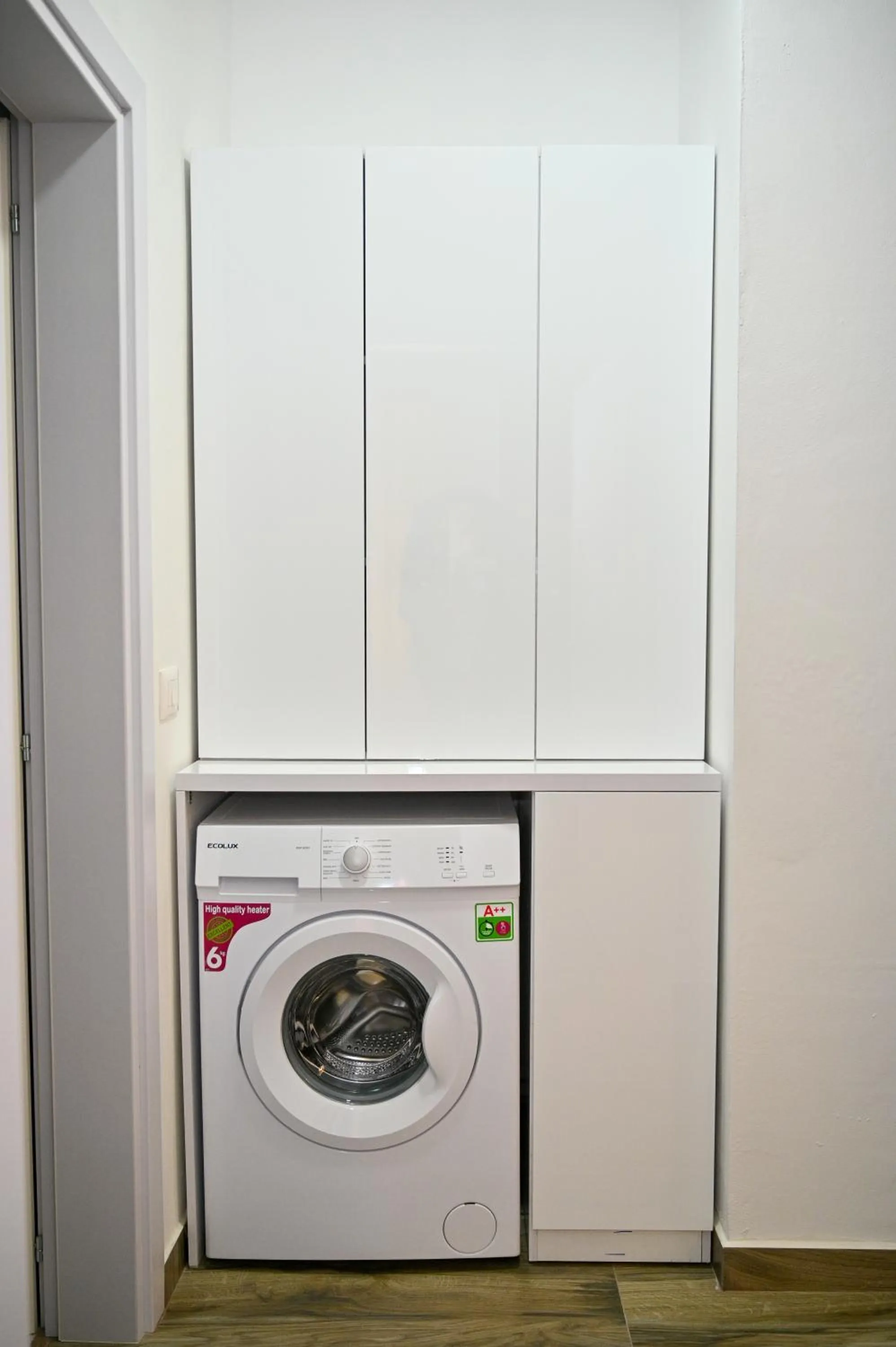 washing machine in Elite Apartments