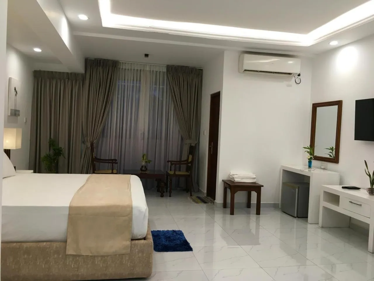 Bed in Lavinia Bay Beach Hotel