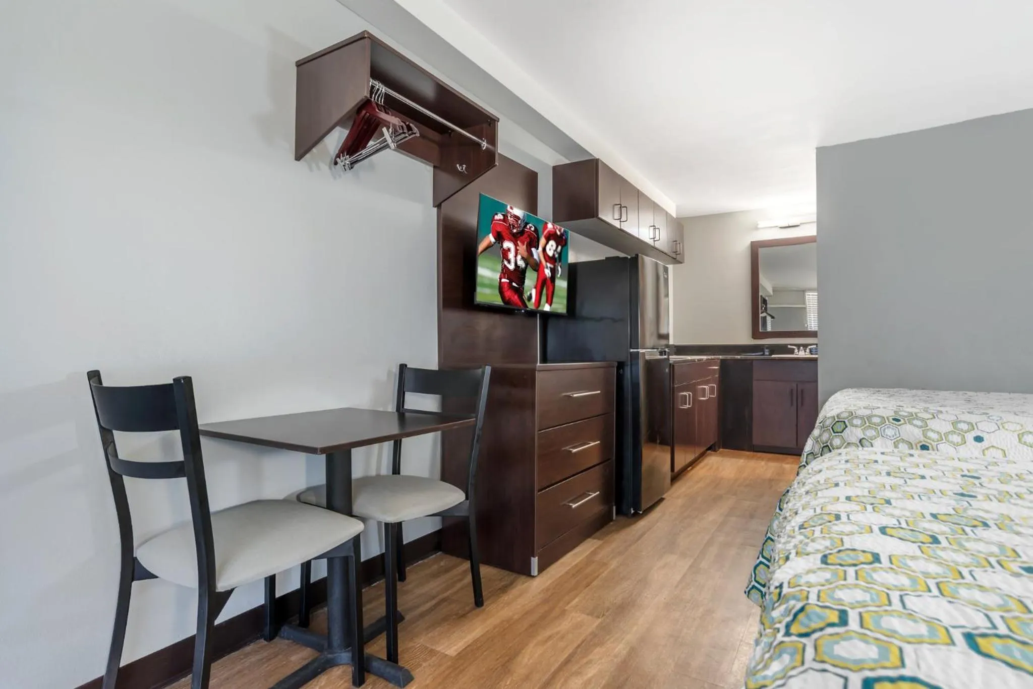 Bedroom, Bed in HomeTowne Studios by Red Roof Montgomery - Midtown