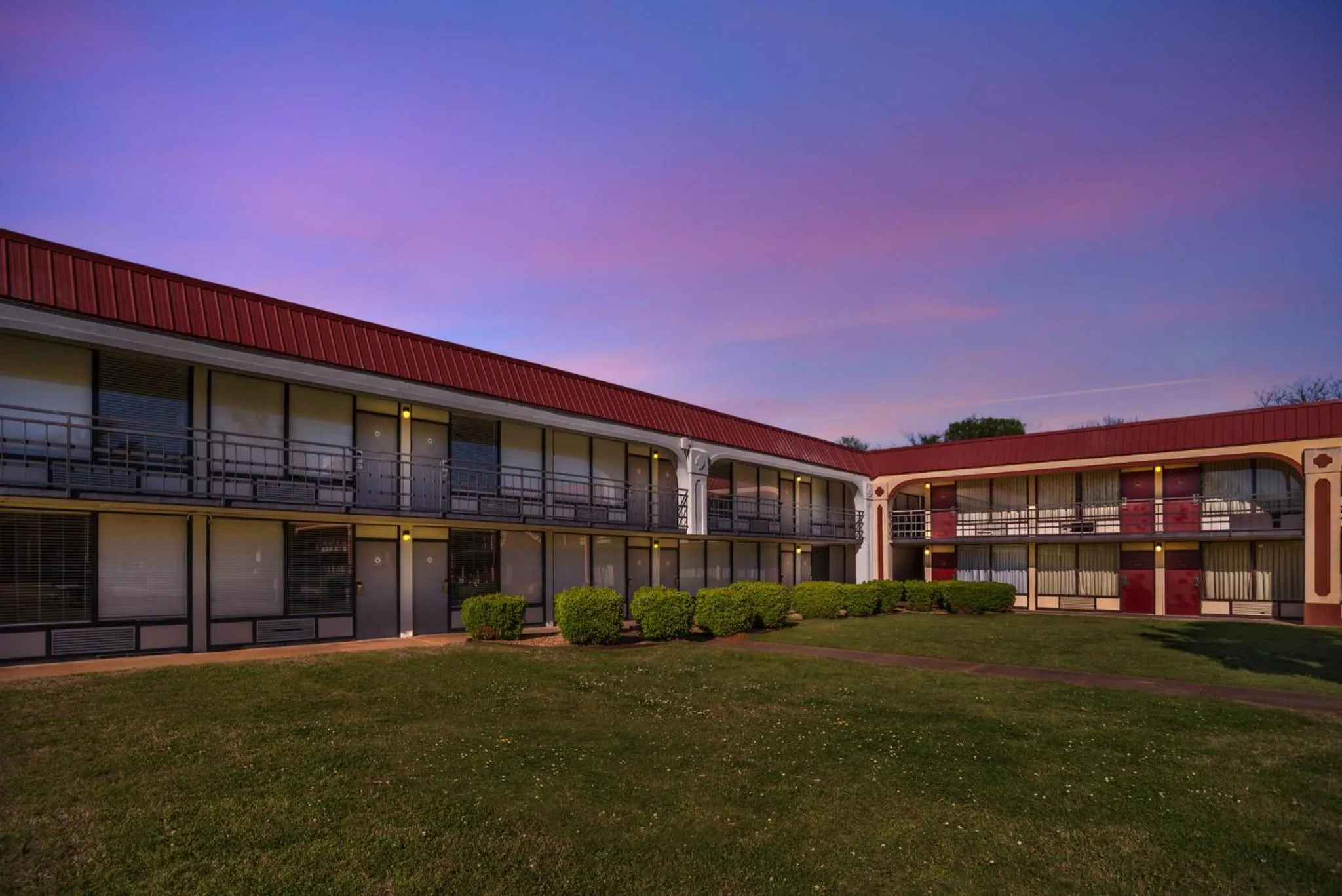 Property building in HomeTowne Studios by Red Roof Montgomery - Midtown
