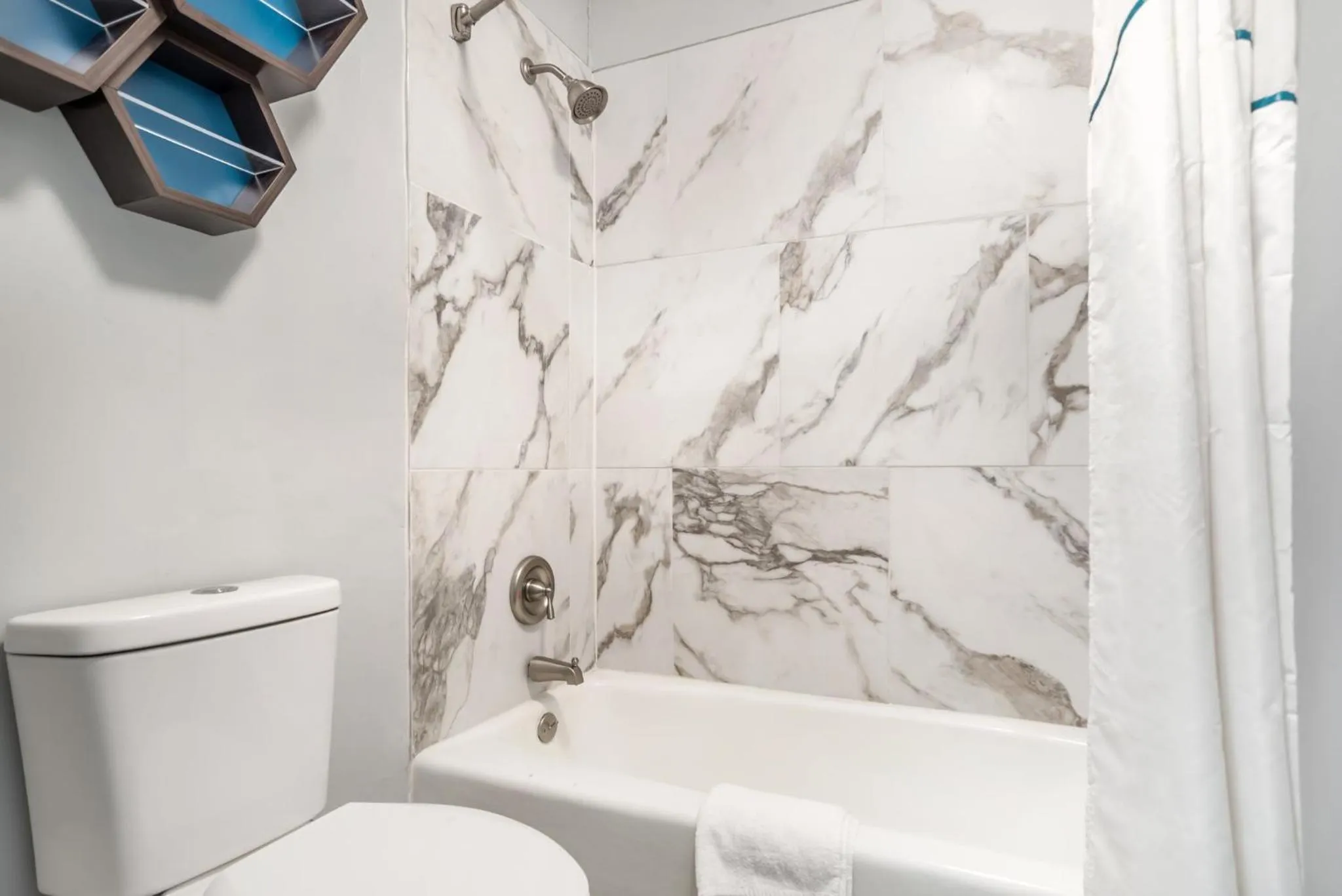 Bathroom in HomeTowne Studios by Red Roof Montgomery - Midtown