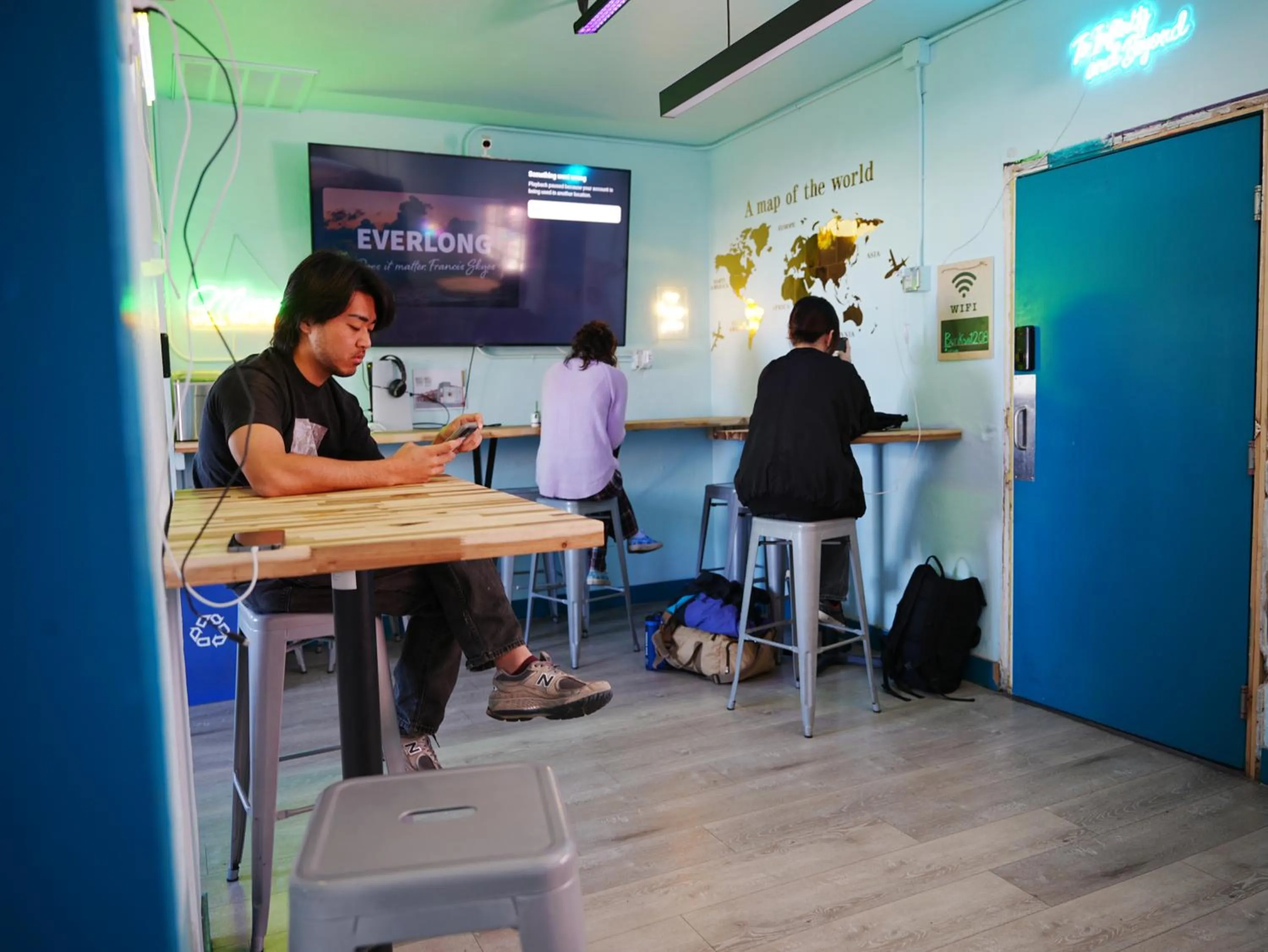 Communal lounge/ TV room in Sin City Hostel