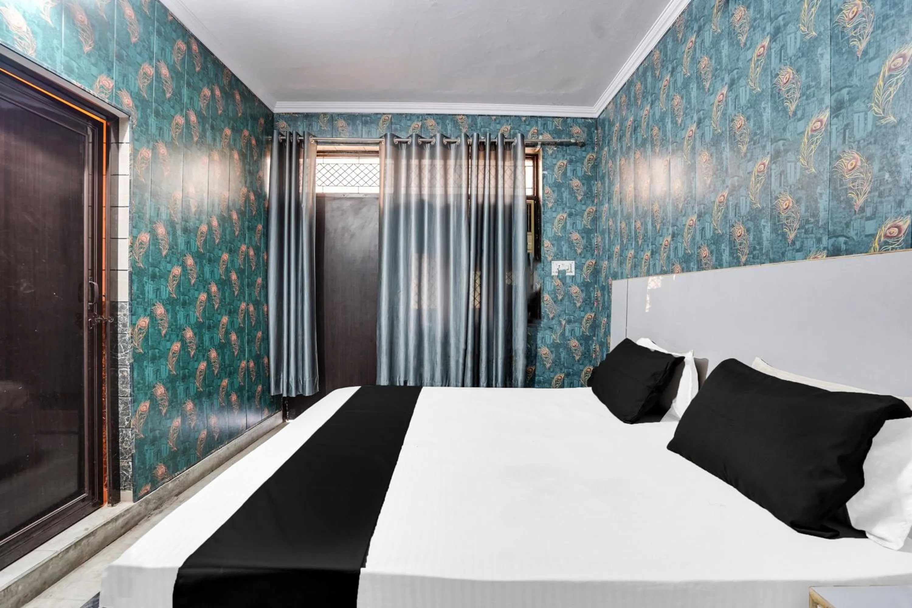 Bedroom, Bed in Hotel O R S Residency