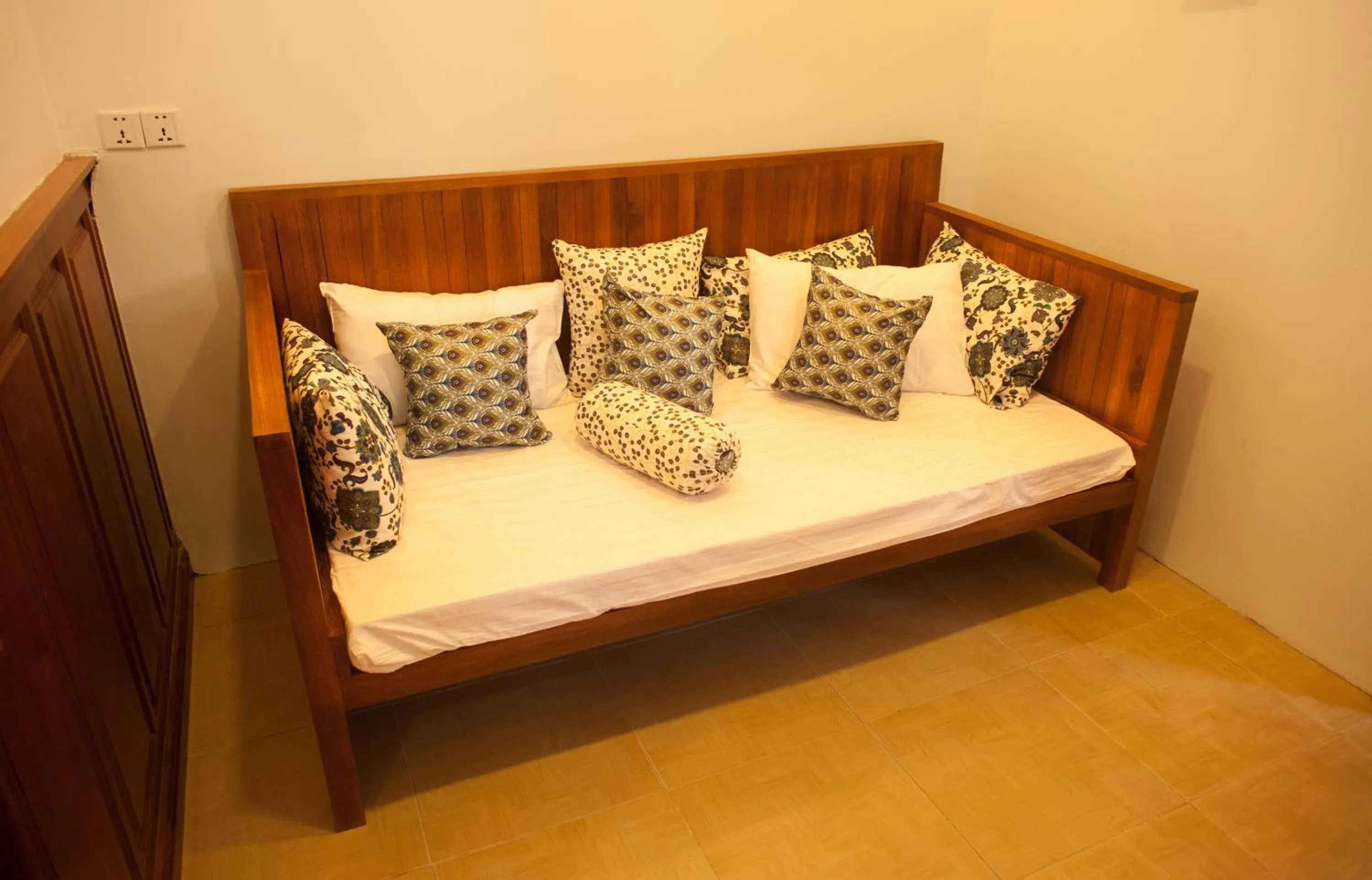 Seating area, Bed in Eureka Villas Siem Reap